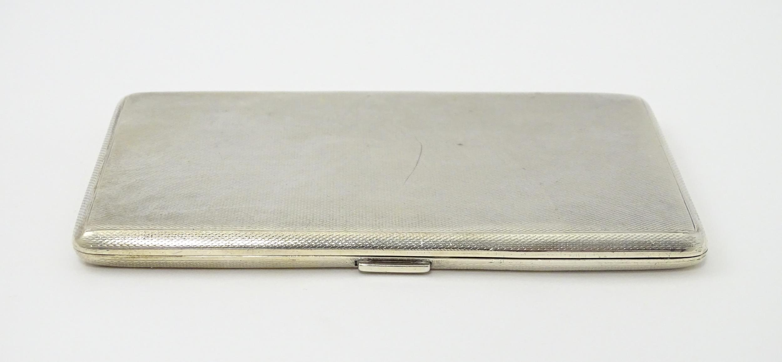 An Art Deco silver cigarette case with three sectional interior hallmarked Birmingham 1933, maker - Image 3 of 11