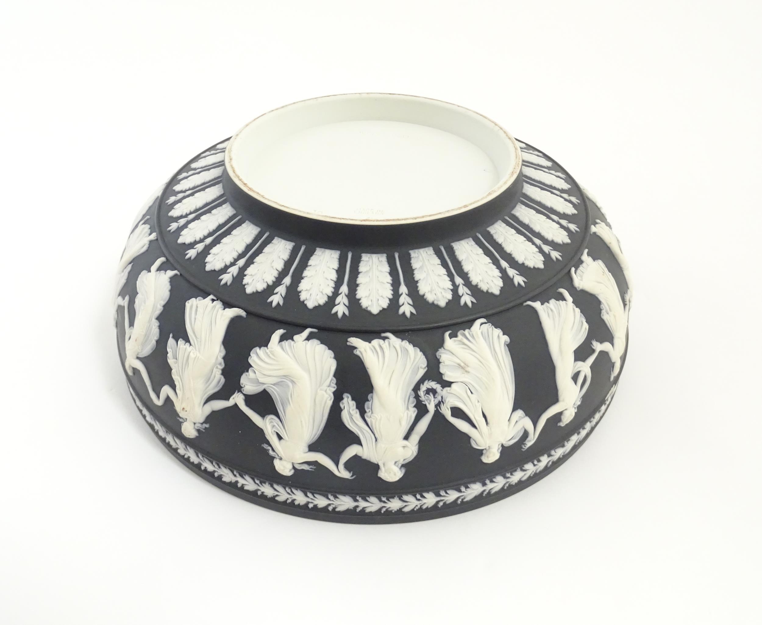 A Wedgwood black Jasperware bowl decorated with Classical maidens / Dancing Hours. Marked under. - Image 7 of 9