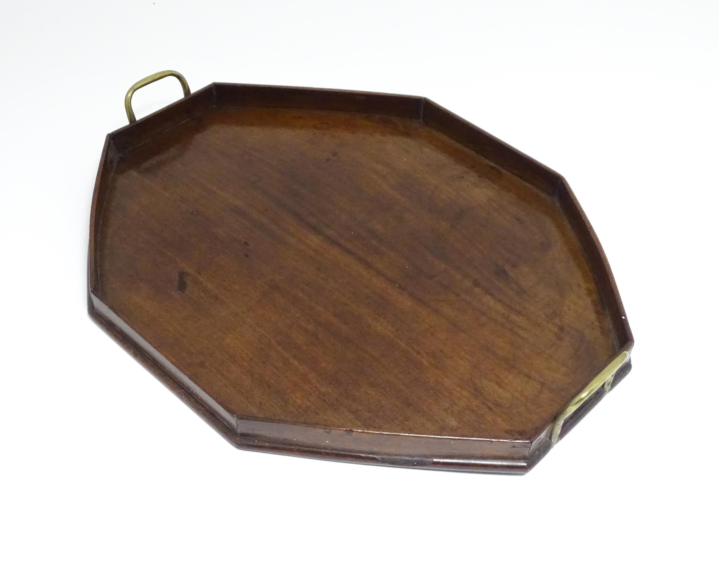 A late 19th / early 20thC mahogany tray of octagonal form with twin handles. Approx. 21 1/4" x 16 - Image 2 of 7