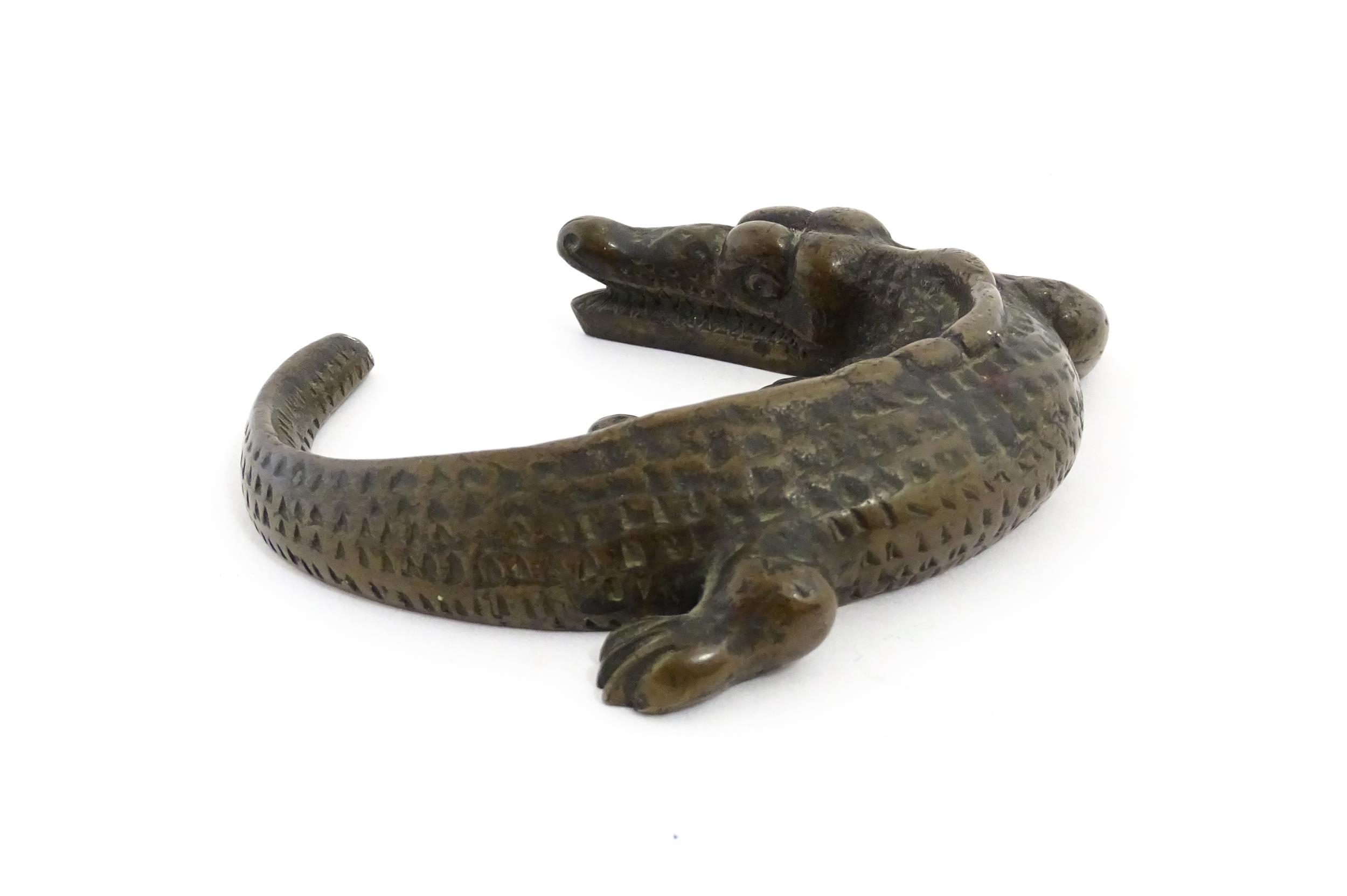 A 20thC cast bronze model of a crocodile / alligator. Approx. 5 1/4" wide Please Note - we do not - Image 4 of 7