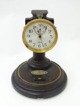 An American Poole electric mantel clock, the 3" silvered dial with subsidiary seconds dial,