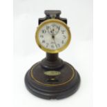 An American Poole electric mantel clock, the 3" silvered dial with subsidiary seconds dial,