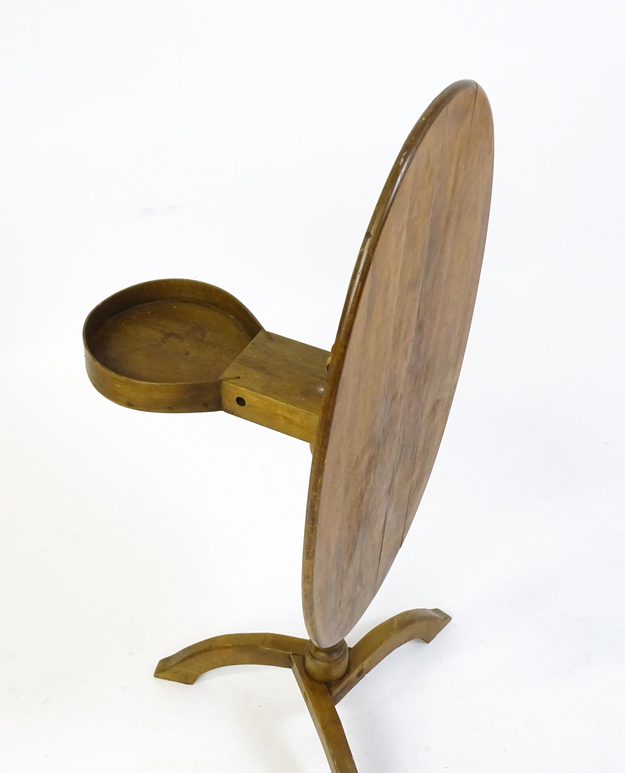 An early 20thC New England style occasional table, with an oval planked top, a storage compartment - Image 5 of 6