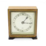 A 20thC mantle clock by Elliott. the dial with Roman numeral chapter ring and signed ' An Elliott