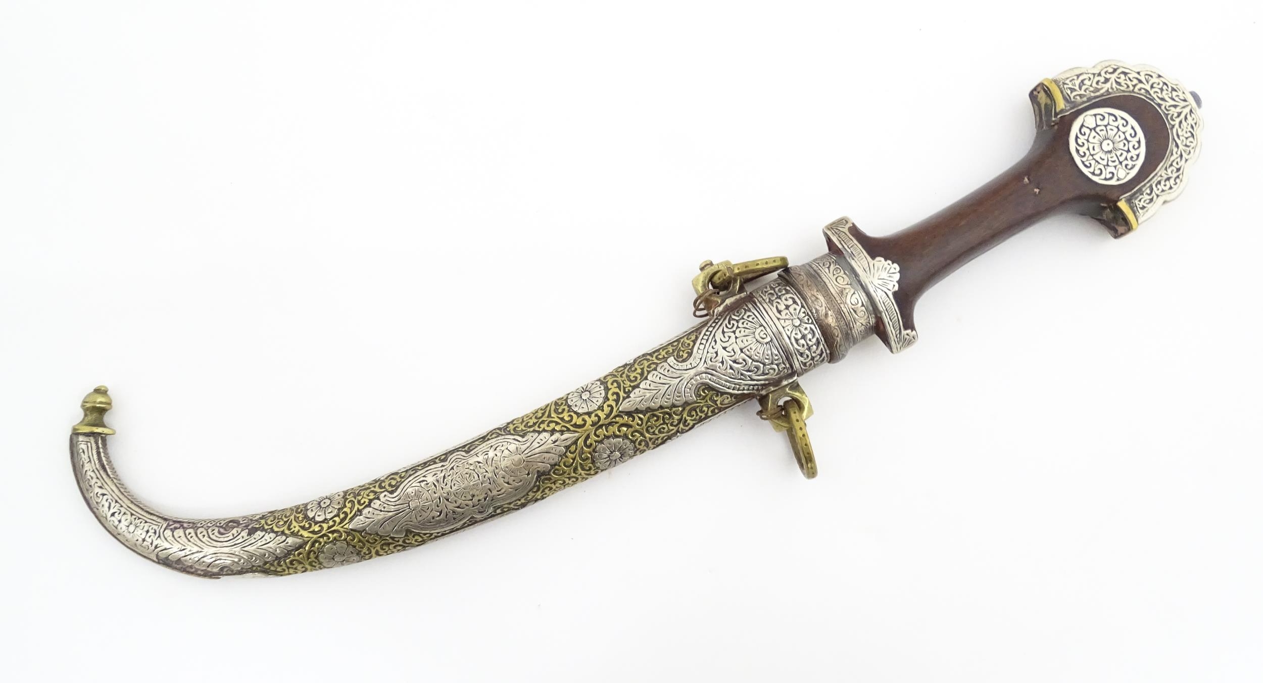 Ethnographic / Native / Tribal: A Moroccan Koummya / Jambiya dagger with carved wooden handle with