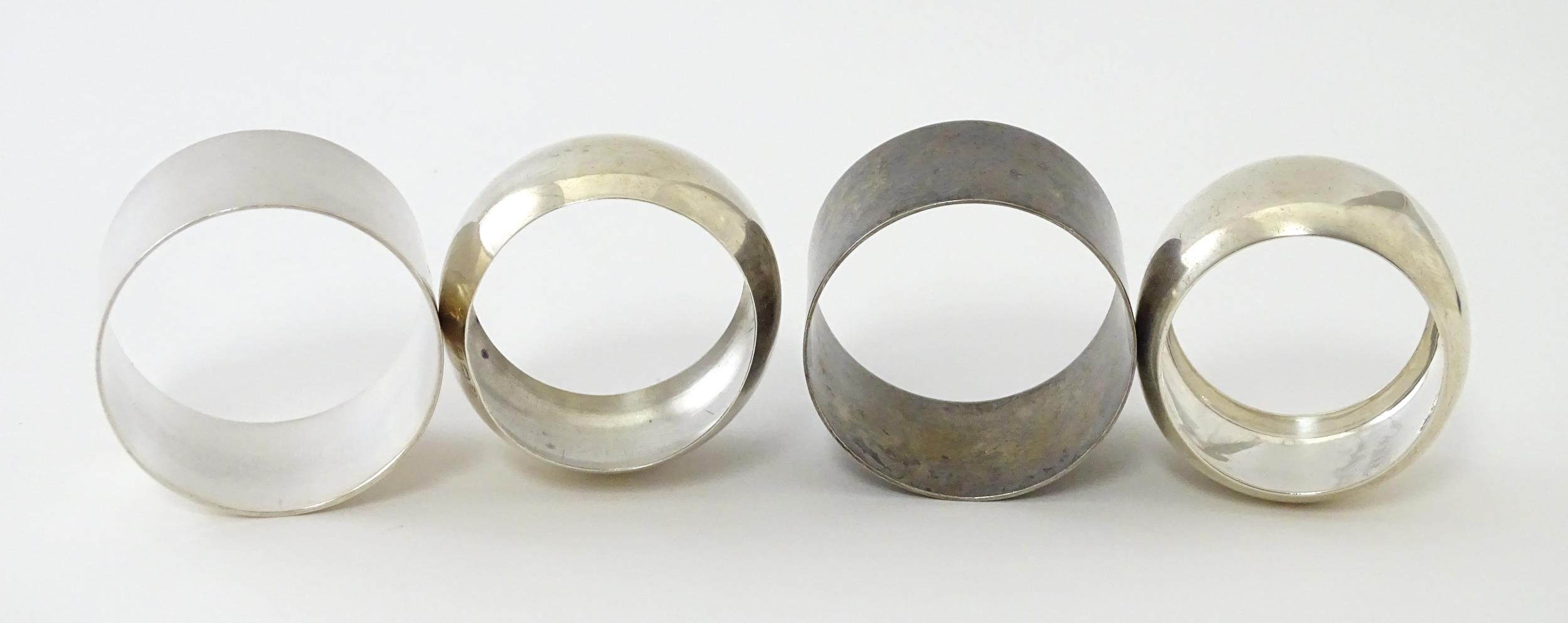 Four assorted silver napkin rings hallmarks to include Birmingham 1911, 1922, Sheffield 1942, - Image 2 of 7