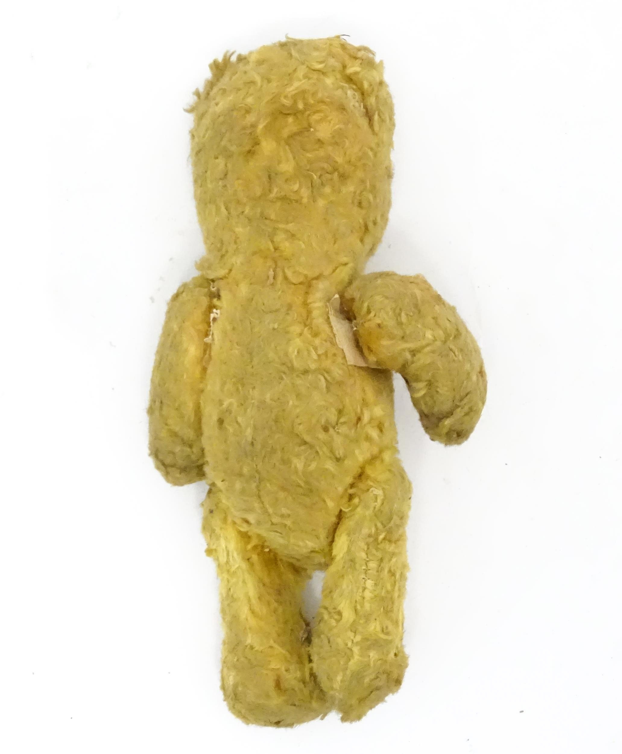 Toy: An early 20thC straw filled teddy bear with stitched nose and articulated limbs. Approx. 7" - Image 6 of 7