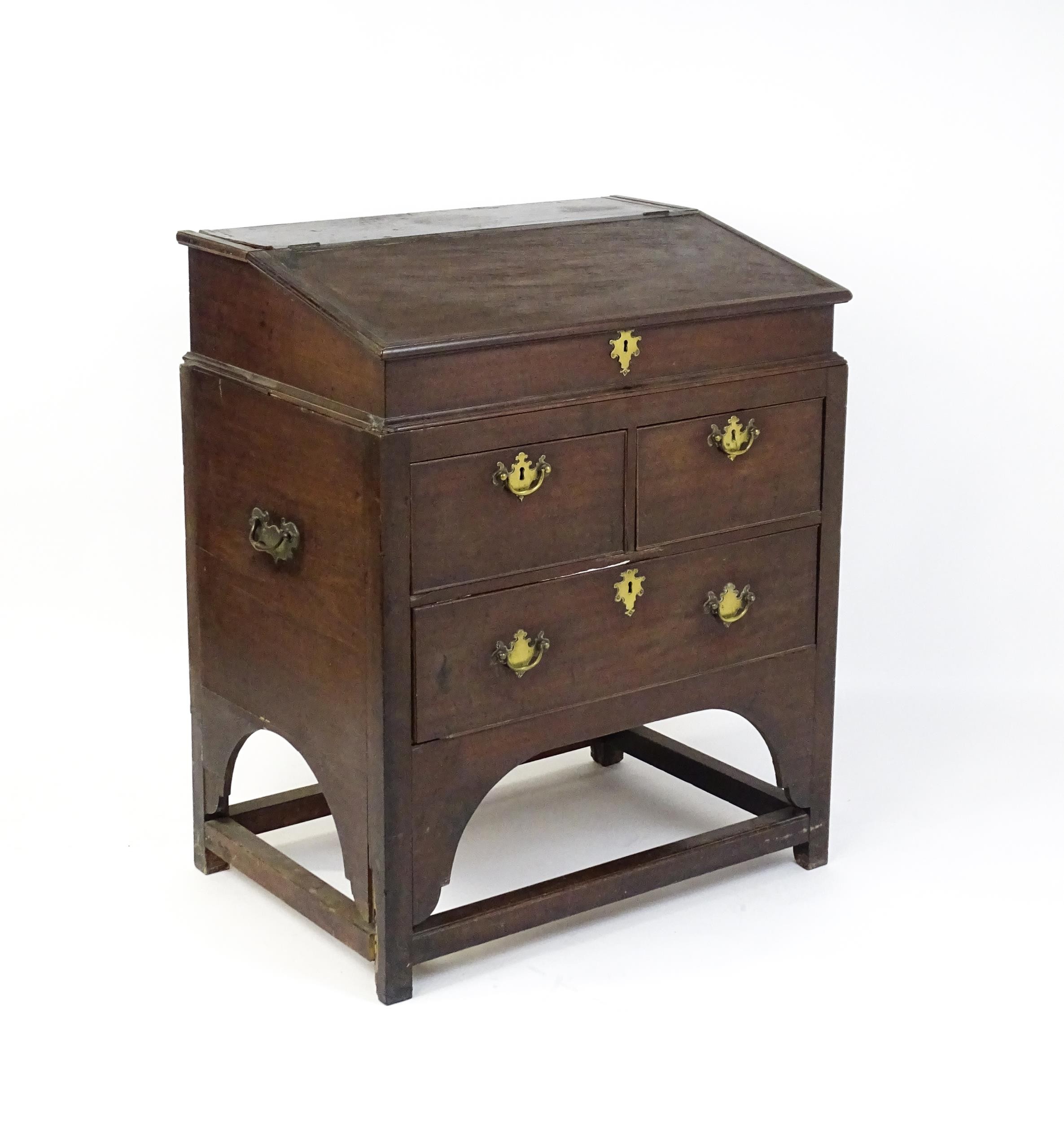 An early / mid 18thC mahogany clerks desk with a hinged sloping lid opening to show a fitted - Image 2 of 8