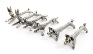 Three pairs of 20thC silver plate novelty knife rests modelled as hares, foxes and boars. Approx.