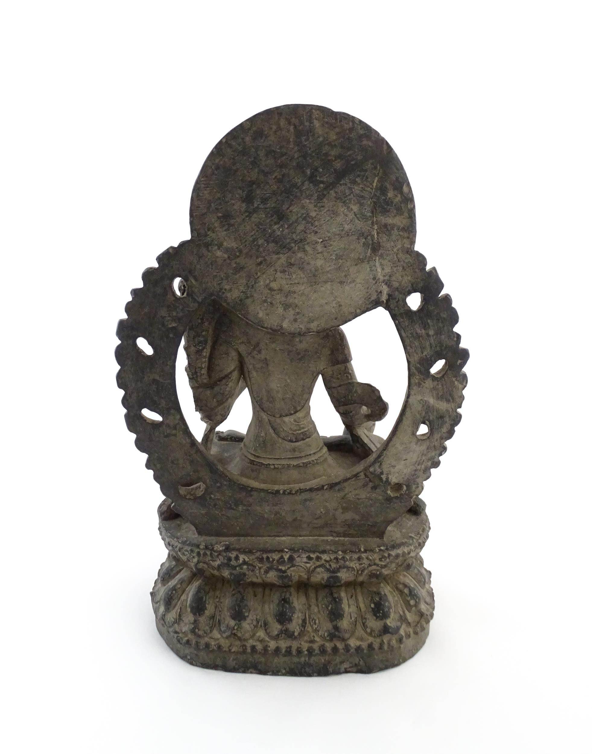 An Asian carved soapstone model of a seated deity on a stylised lotus. Approx. 14 1/2" high Please - Image 5 of 8