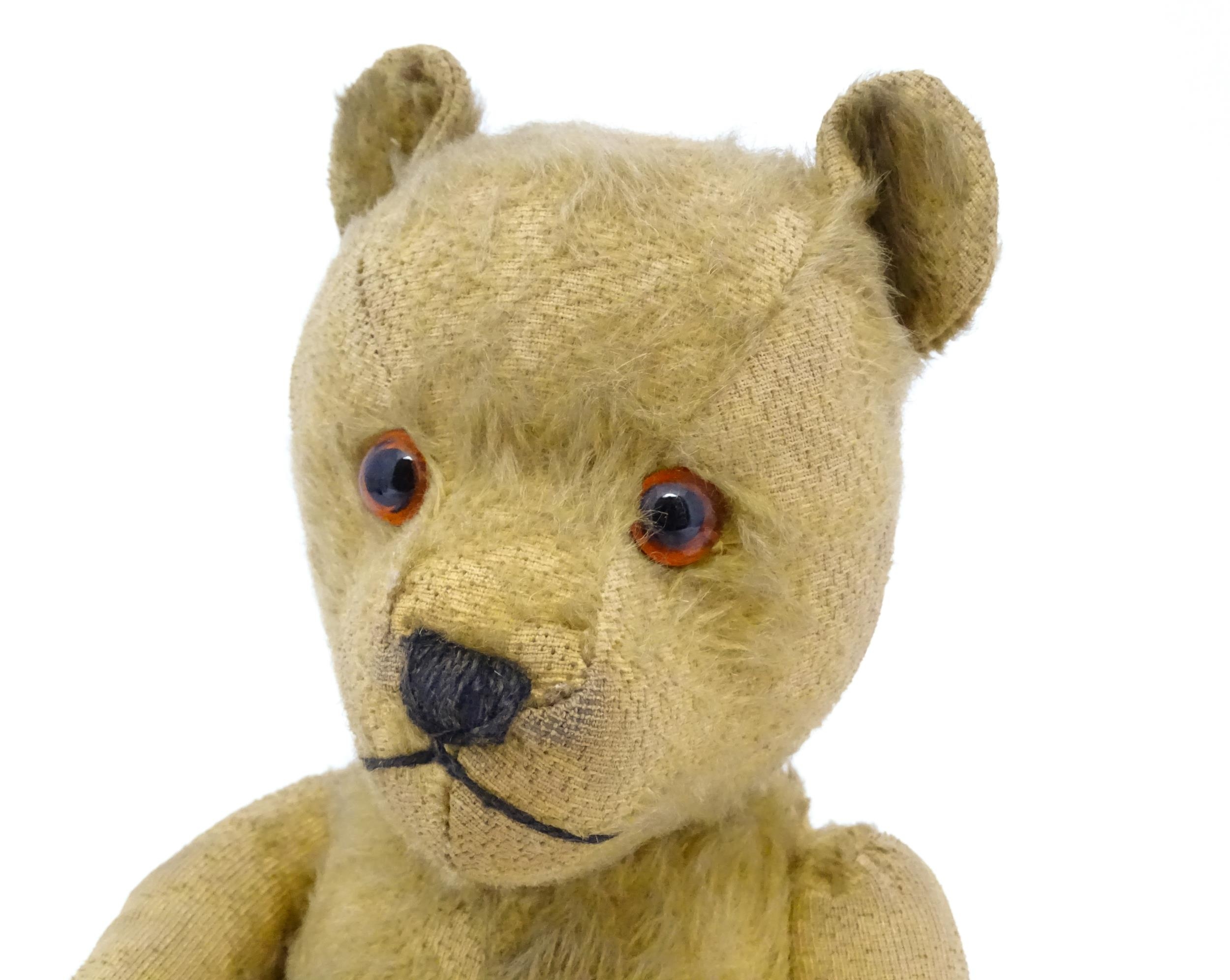 Toy: An early 20thC mohair straw filled teddy bear with stitched nose and mouth, articulated limbs - Image 4 of 8