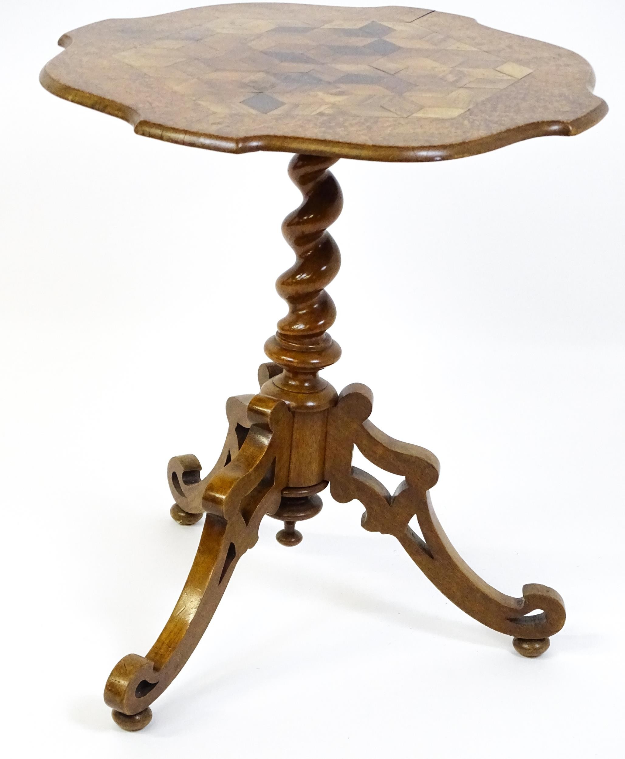 A 19thC tripod table with a burr amboyna veneered top surrounding a central parquetry style sample - Image 8 of 10