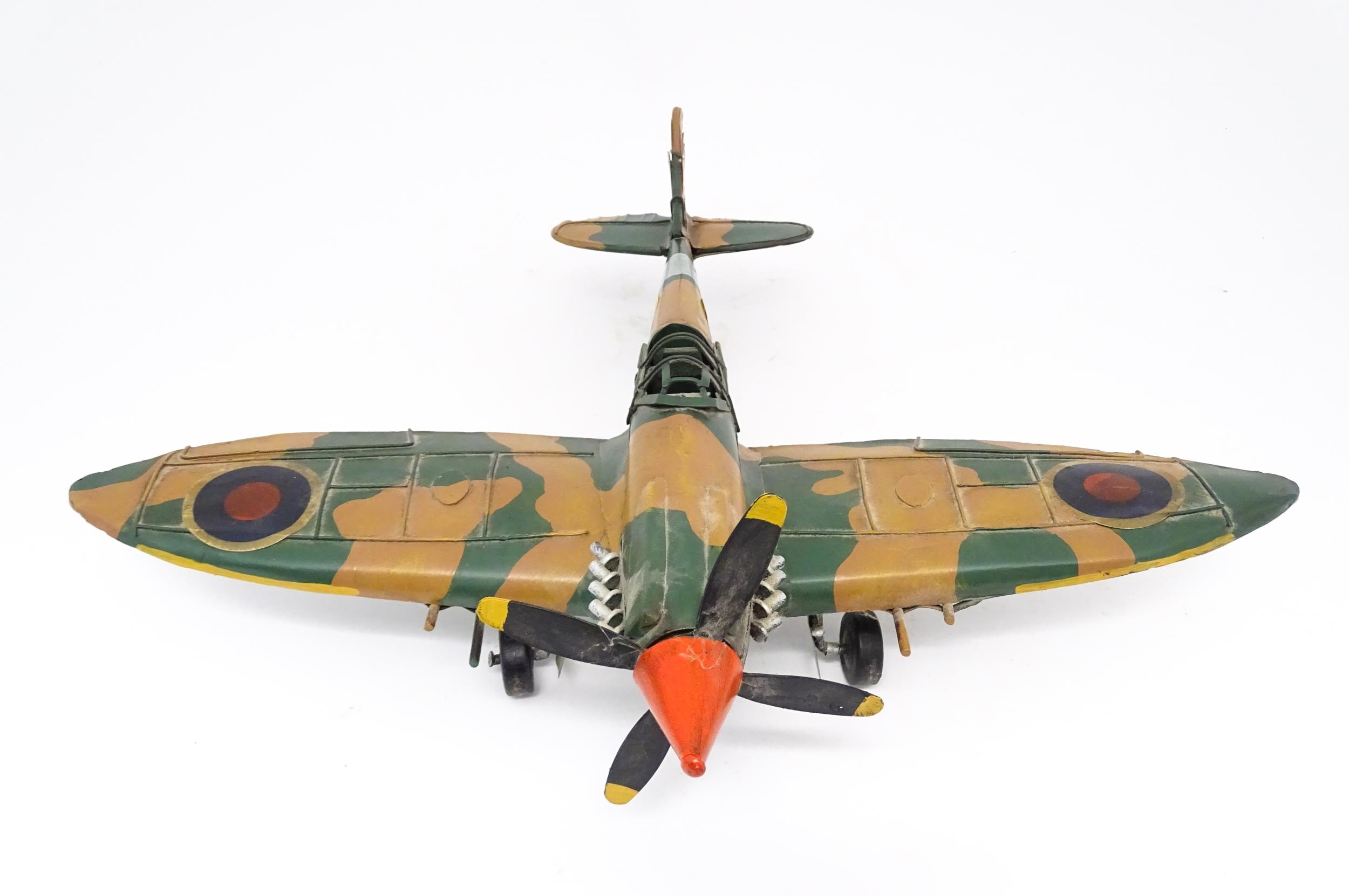 A 20thC scratch built tin plate scale model of a spitfire. Approx. 18" wide Please Note - we do - Image 3 of 10