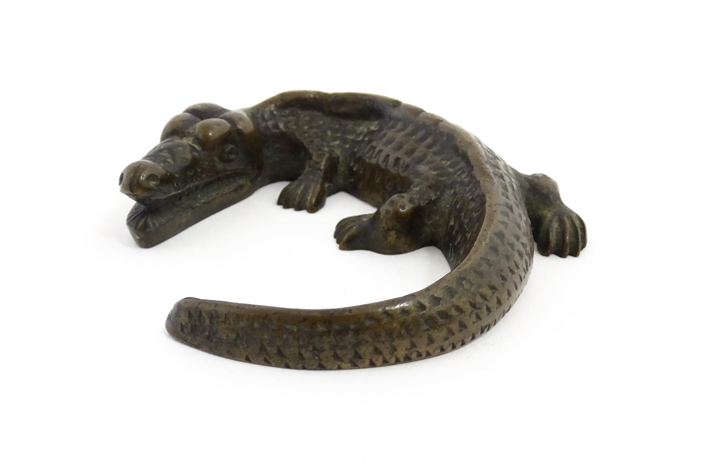 A 20thC cast bronze model of a crocodile / alligator. Approx. 5 1/4" wide Please Note - we do not - Image 3 of 7