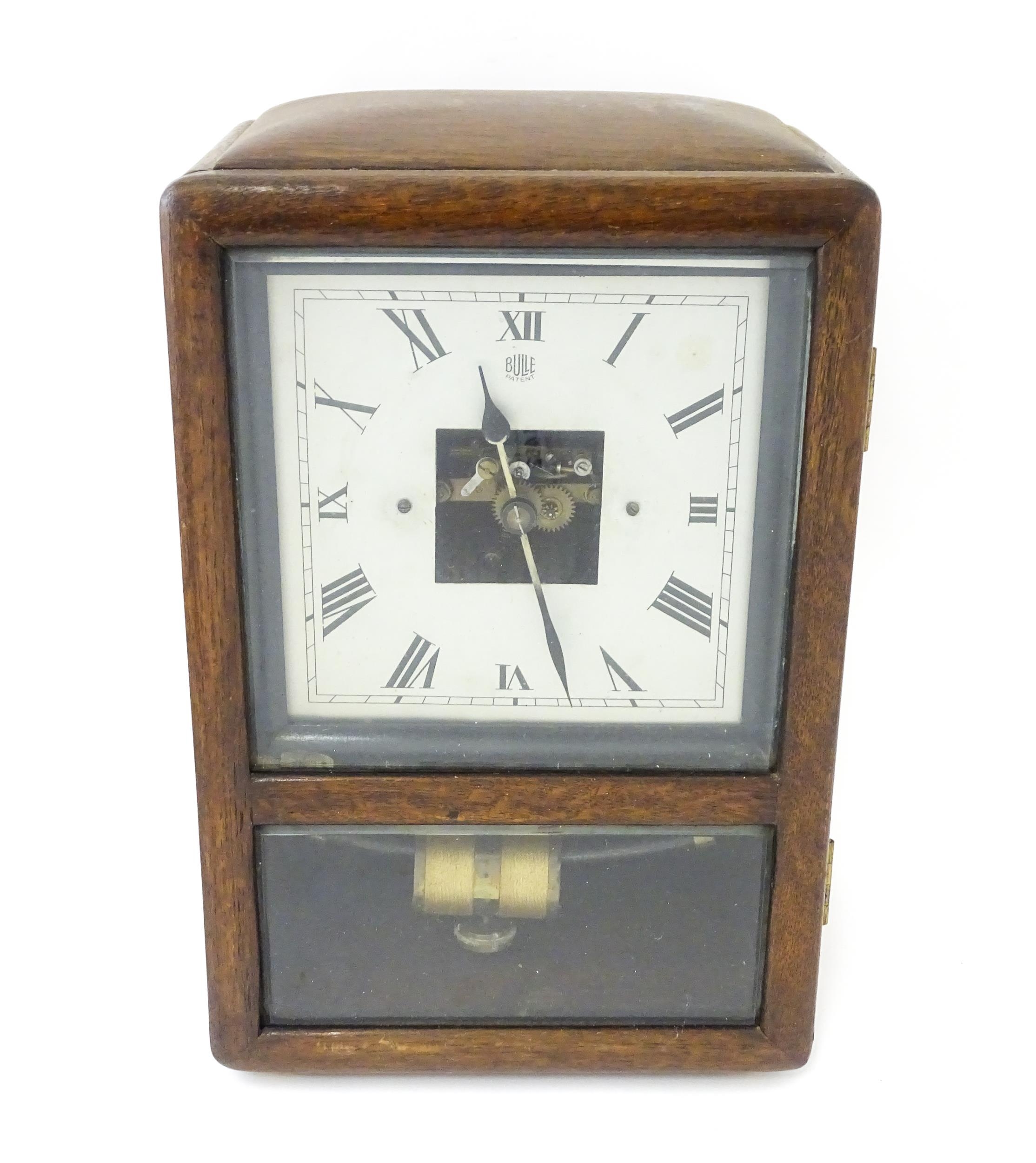 Bulle : A French Art Deco oak cased electric mantel clock by Bulle. The dial signed Bulle Patent - Image 9 of 9