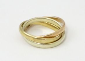 A 9ct tri-gold Russian wedding ring. Ring size approx. G 1/2 Please Note - we do not make