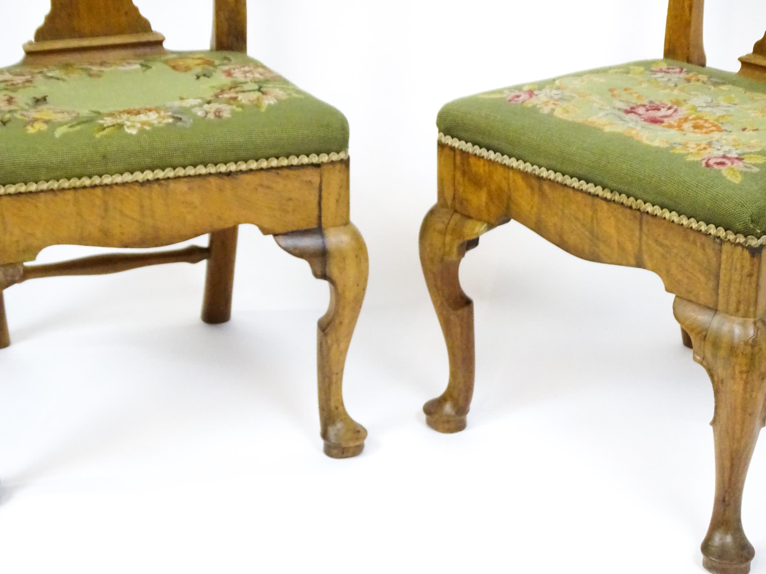 A pair of George II walnut side chairs with shaped top rails above pierced splats and raised on - Image 5 of 7