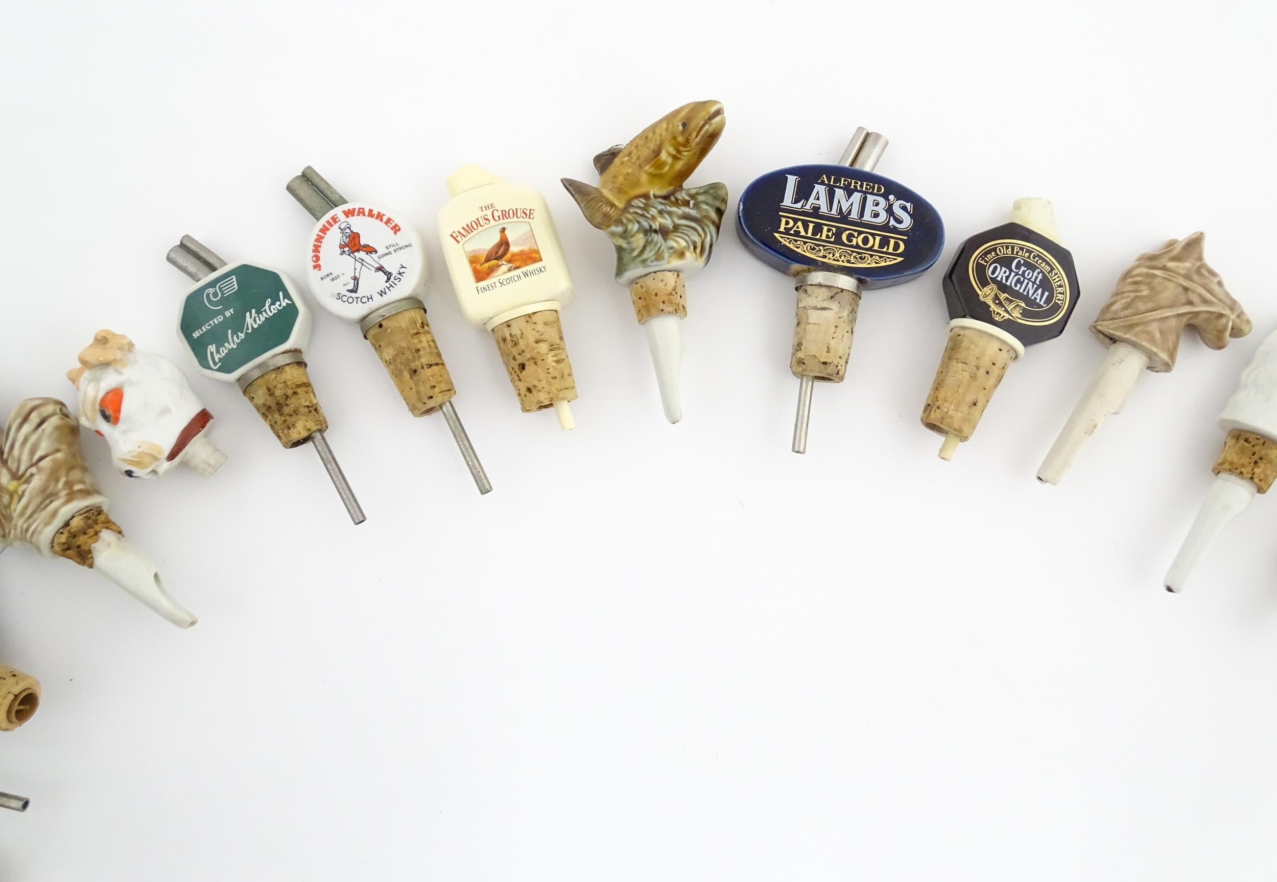 Breweriana : A quantity of assorted 20thC advertising bottle stoppers / pourers to include Booth's - Image 6 of 16
