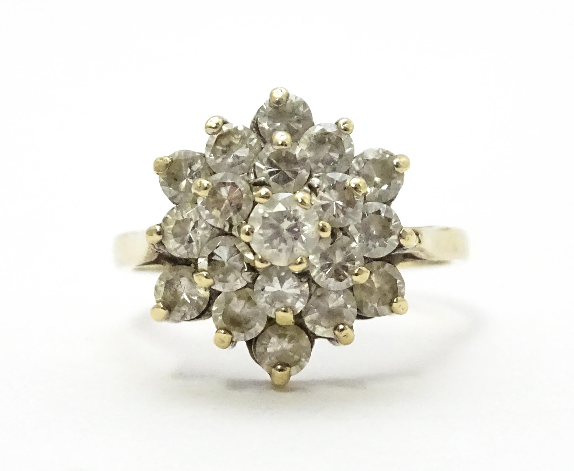 A 9ct gold ring set with diamonds in a floral cluster setting. Ring size approx. M Please Note - - Image 3 of 8