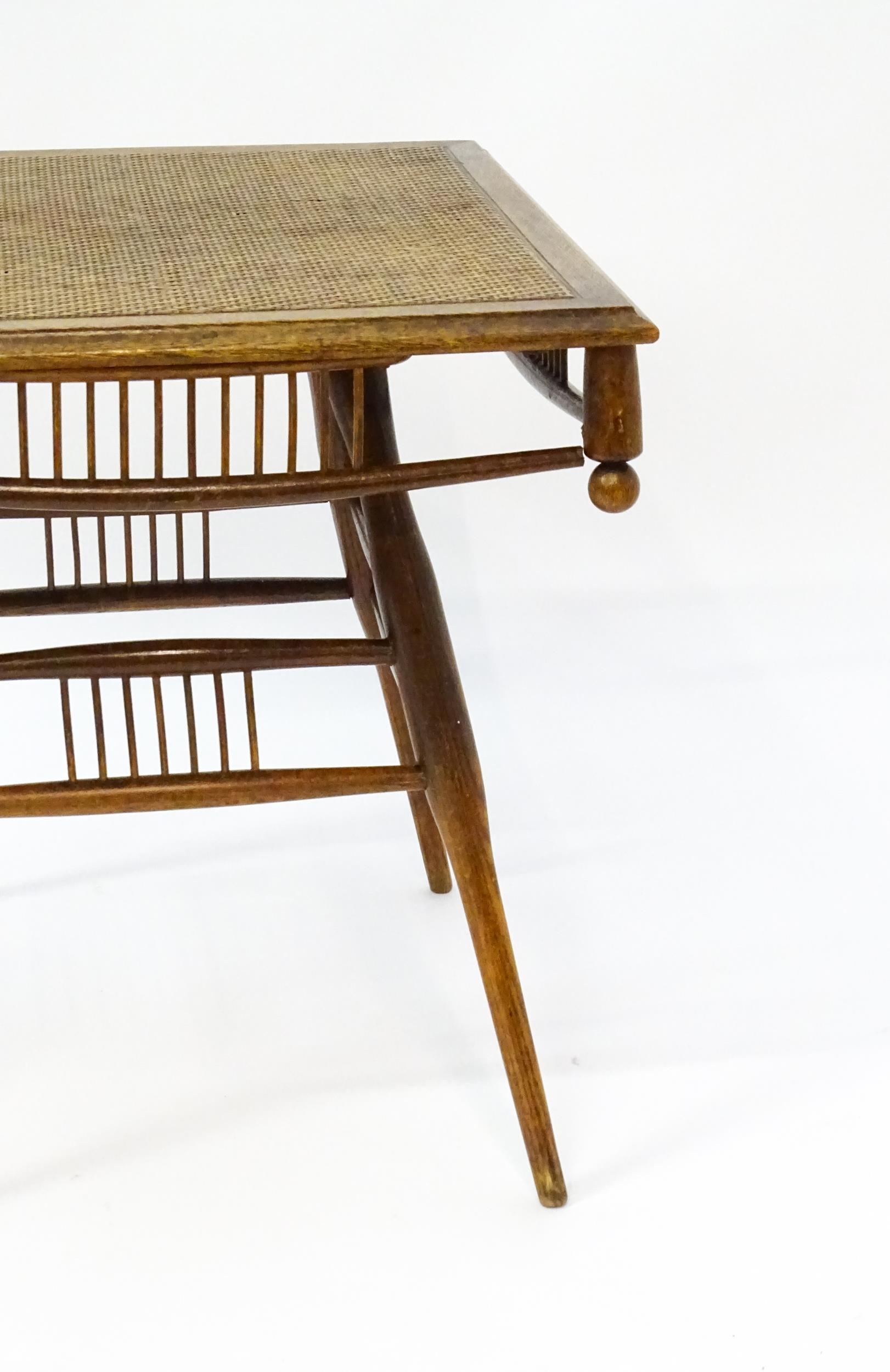 An unusual late 19thC Arts & Crafts table with a rattan inlaid moulded top above three tiers of - Image 2 of 10