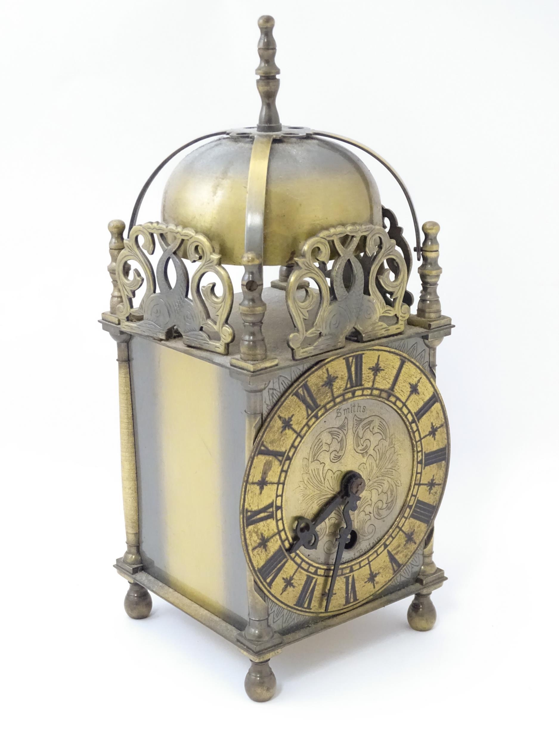 Smiths - Great Britain : A 20thC brass lantern clock by Smiths with engraved dial and Roman - Image 4 of 11