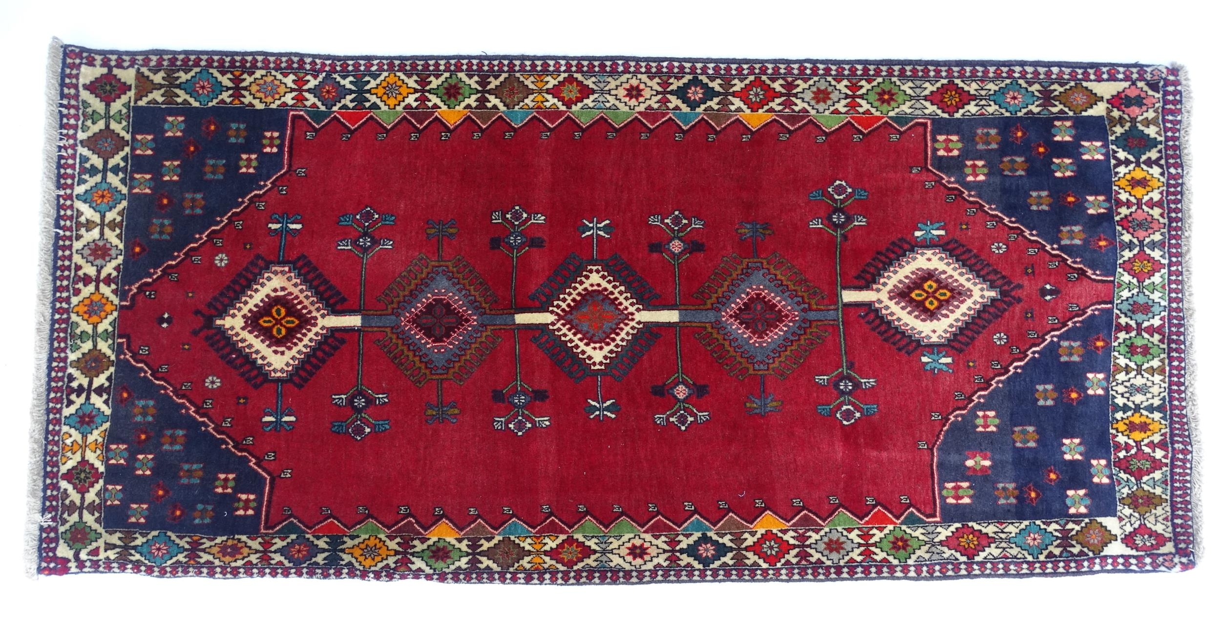 Carpet / Rug: A South West Persian Qashqai rug the red ground decorated with geometric motifs. - Image 3 of 9