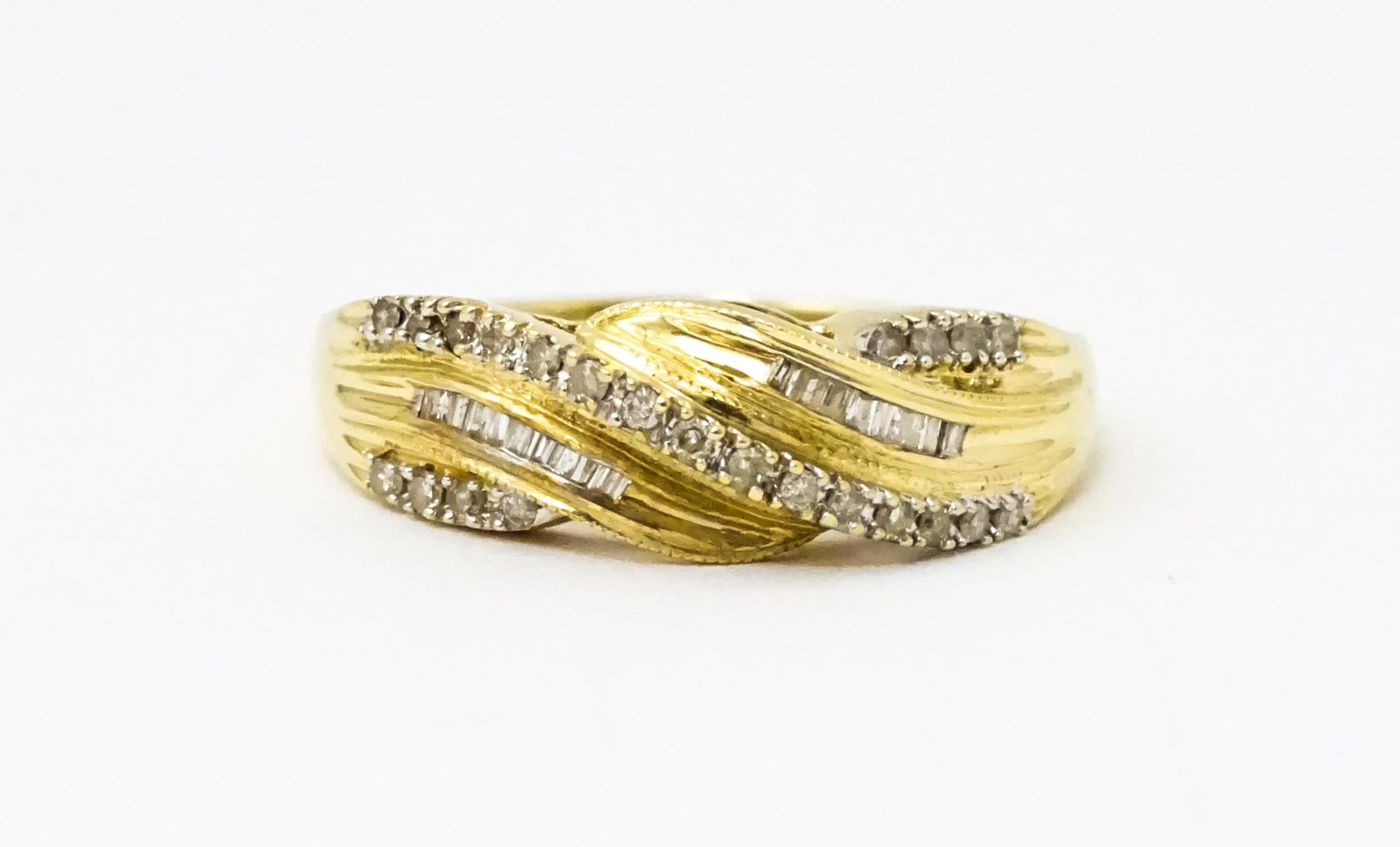 A 14ct gold with twist detail set with diamonds. Ring size approx. Q 1/2 Please Note - we do not - Image 7 of 7