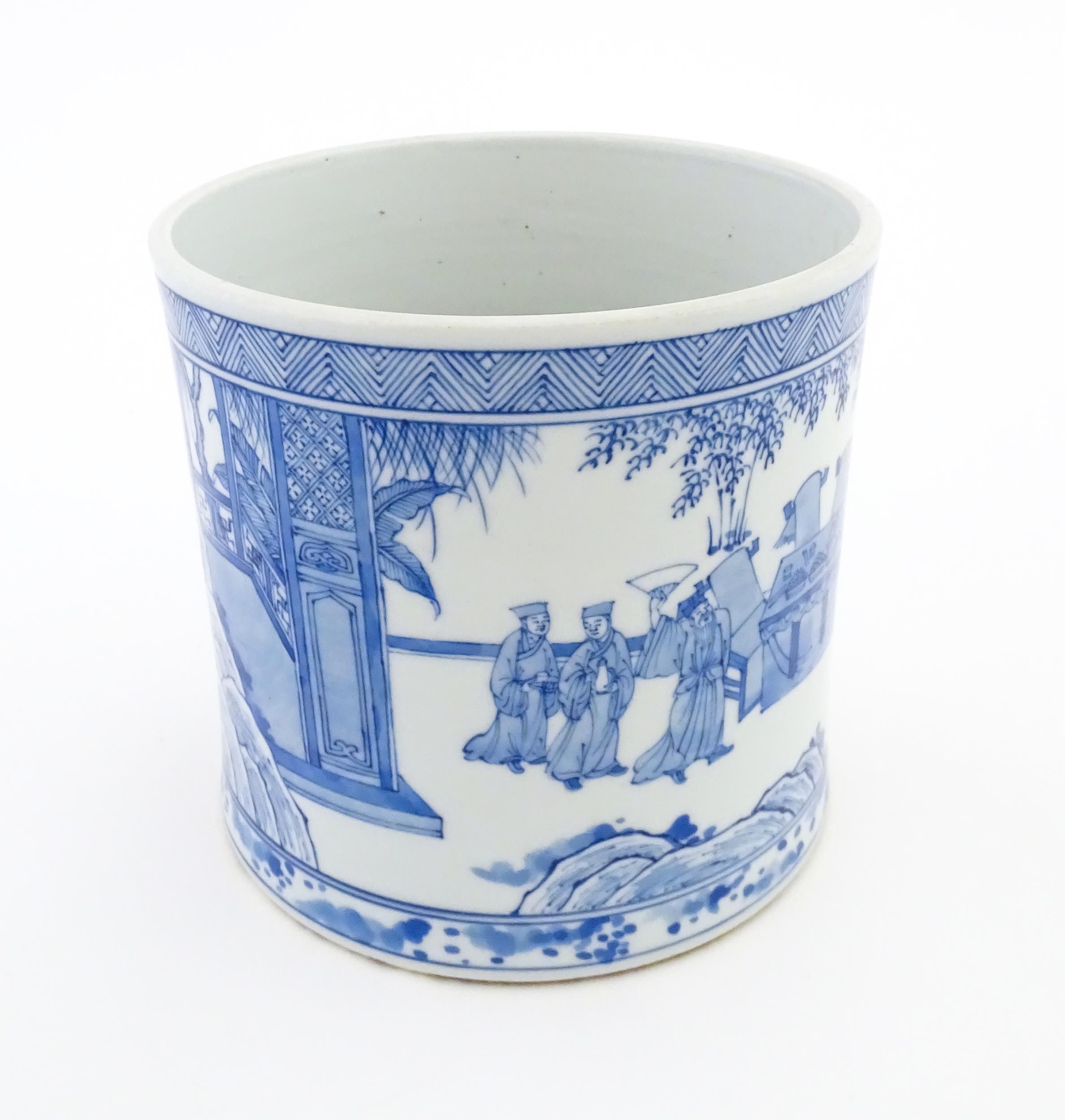 A Chinese blue and white vase / planter decorated with figures in a garden setting with a feast, and - Image 5 of 8