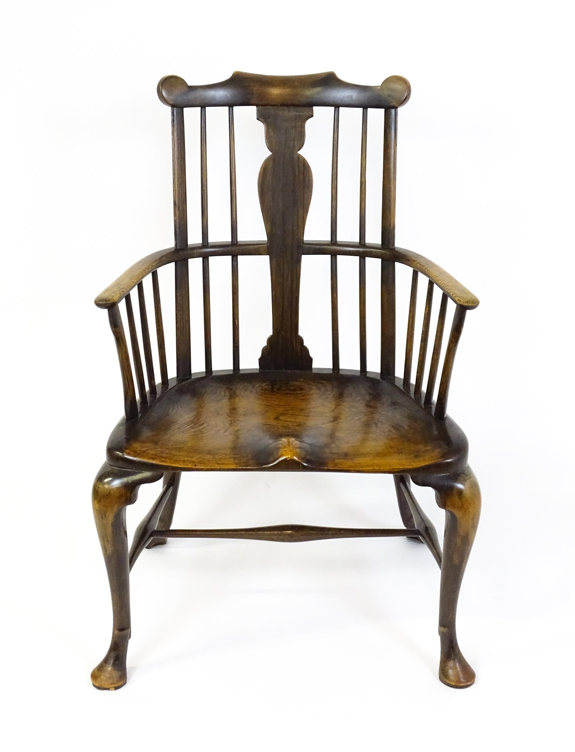 A late 19thC / early 20thC comb back Windsor chair with a vase shaped back splat and an unusually - Image 3 of 6