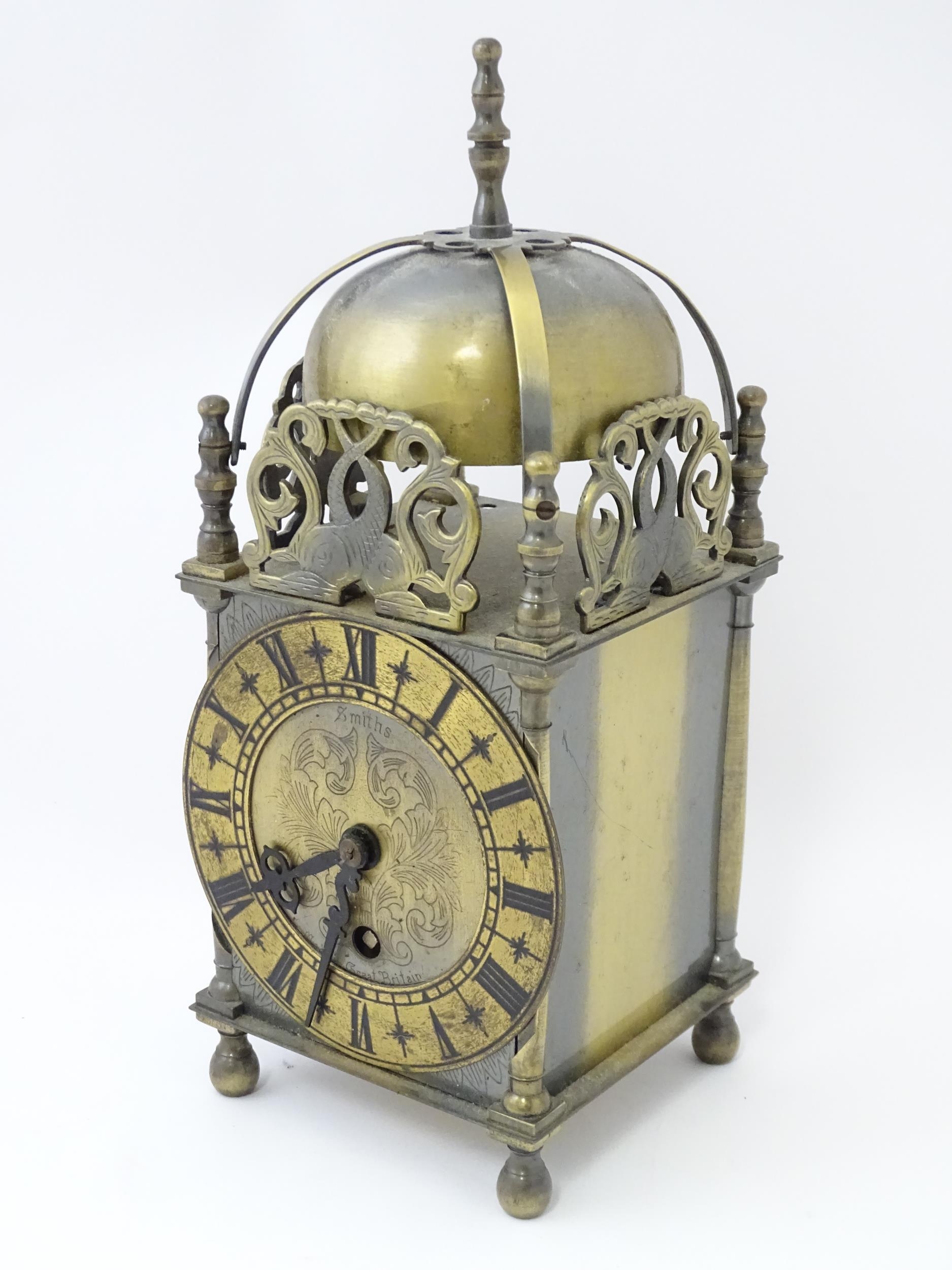 Smiths - Great Britain : A 20thC brass lantern clock by Smiths with engraved dial and Roman - Image 5 of 11