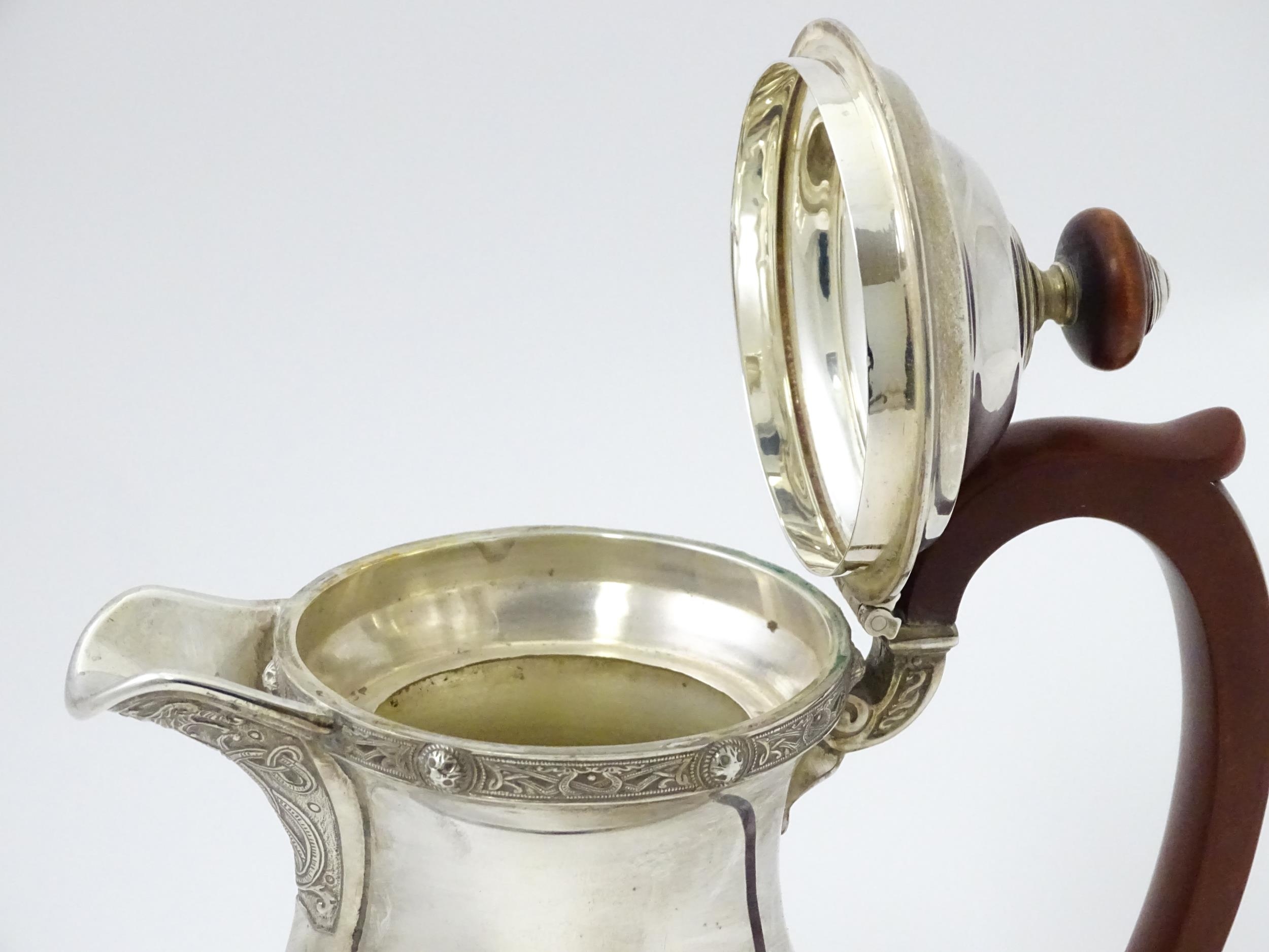 A three piece silver tea set comprising teapot, hot water pot and cream jug, with Celtic style - Image 12 of 20