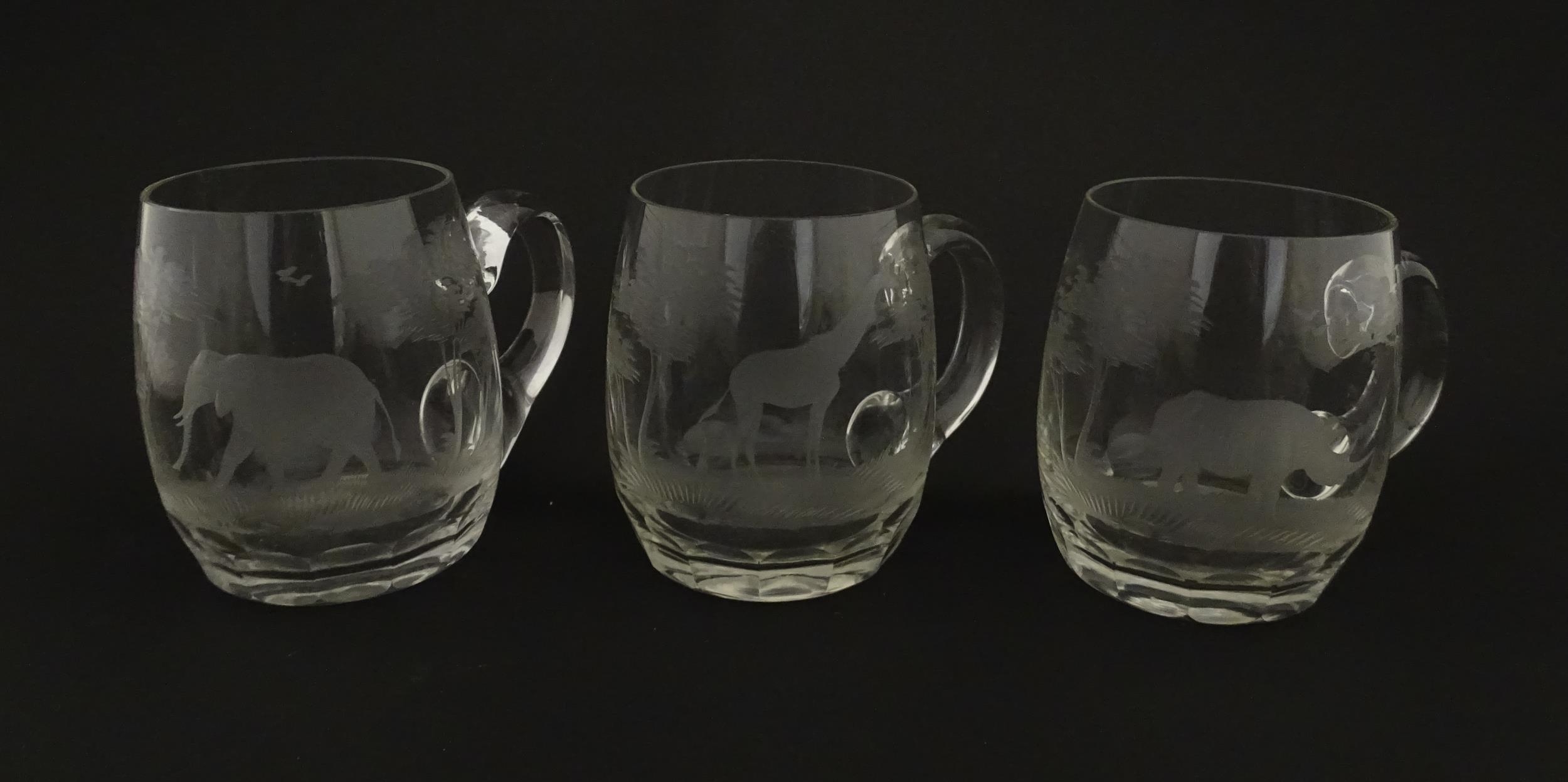 Seven Rowland Ward pint mugs / glasses with engraved Safari animal detail. Unsigned. Approx. 4 1/ - Image 2 of 26