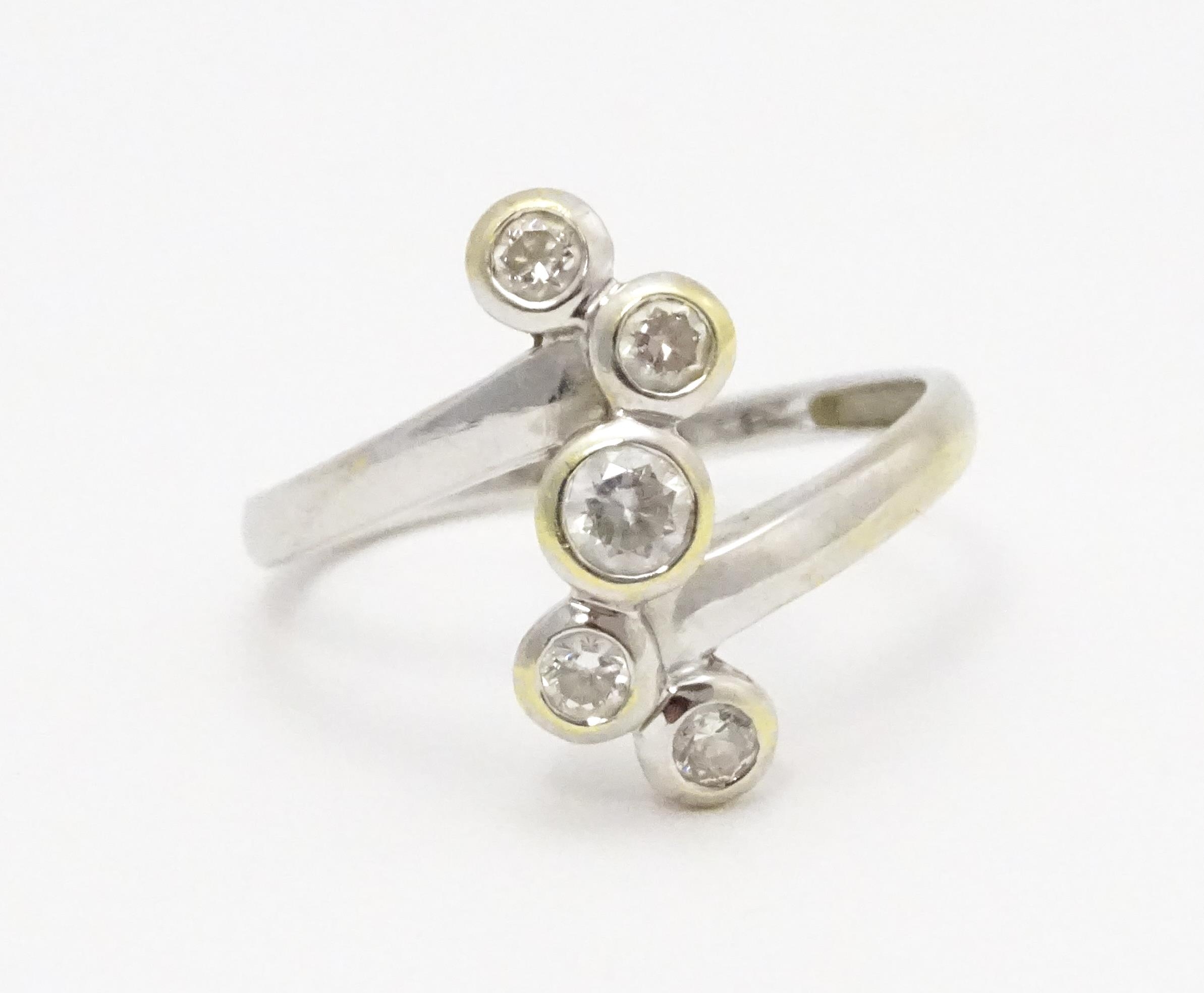 A 14ct white gold ring set with five white stones. Ring size approx. U Please Note - we do not - Image 3 of 8