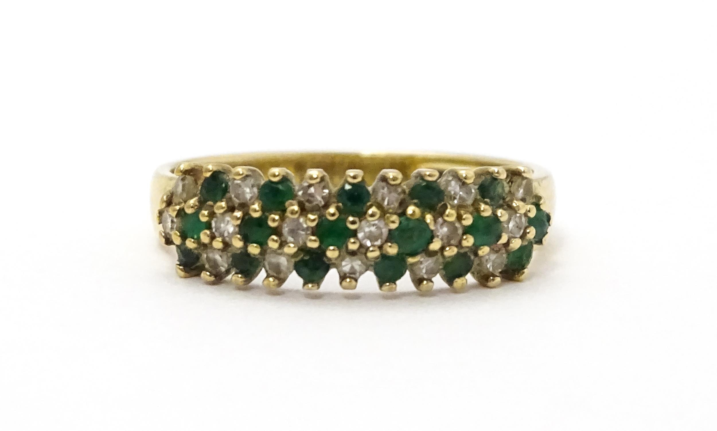 A 9ct gold ring set with emeralds and diamonds. Ring size approx. K Please Note - we do not make - Image 3 of 6