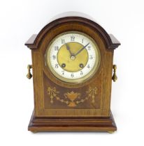 A late 19thC / early 20thC German mahogany cased mantel clock by Philipp Haas & Sohne. The case with