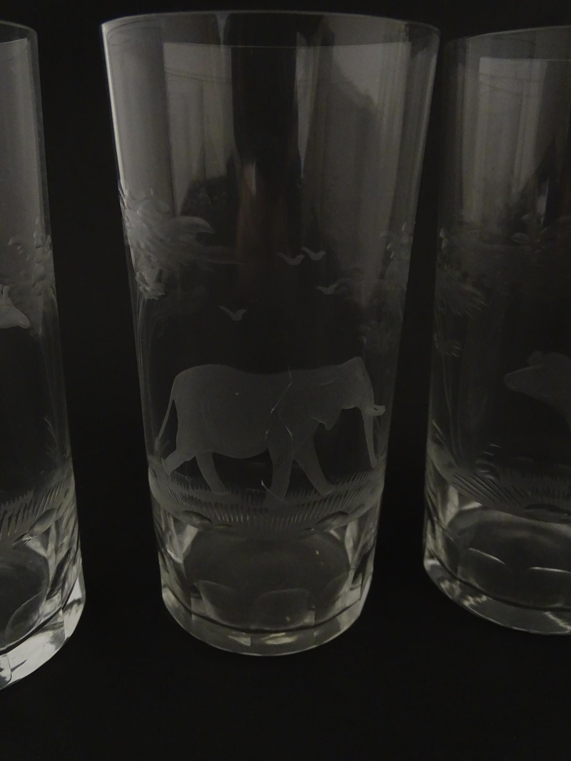 Six Rowland Ward highball glasses with engraved Safari animal detail. Unsigned. Approx. 5 1/2" - Image 11 of 17