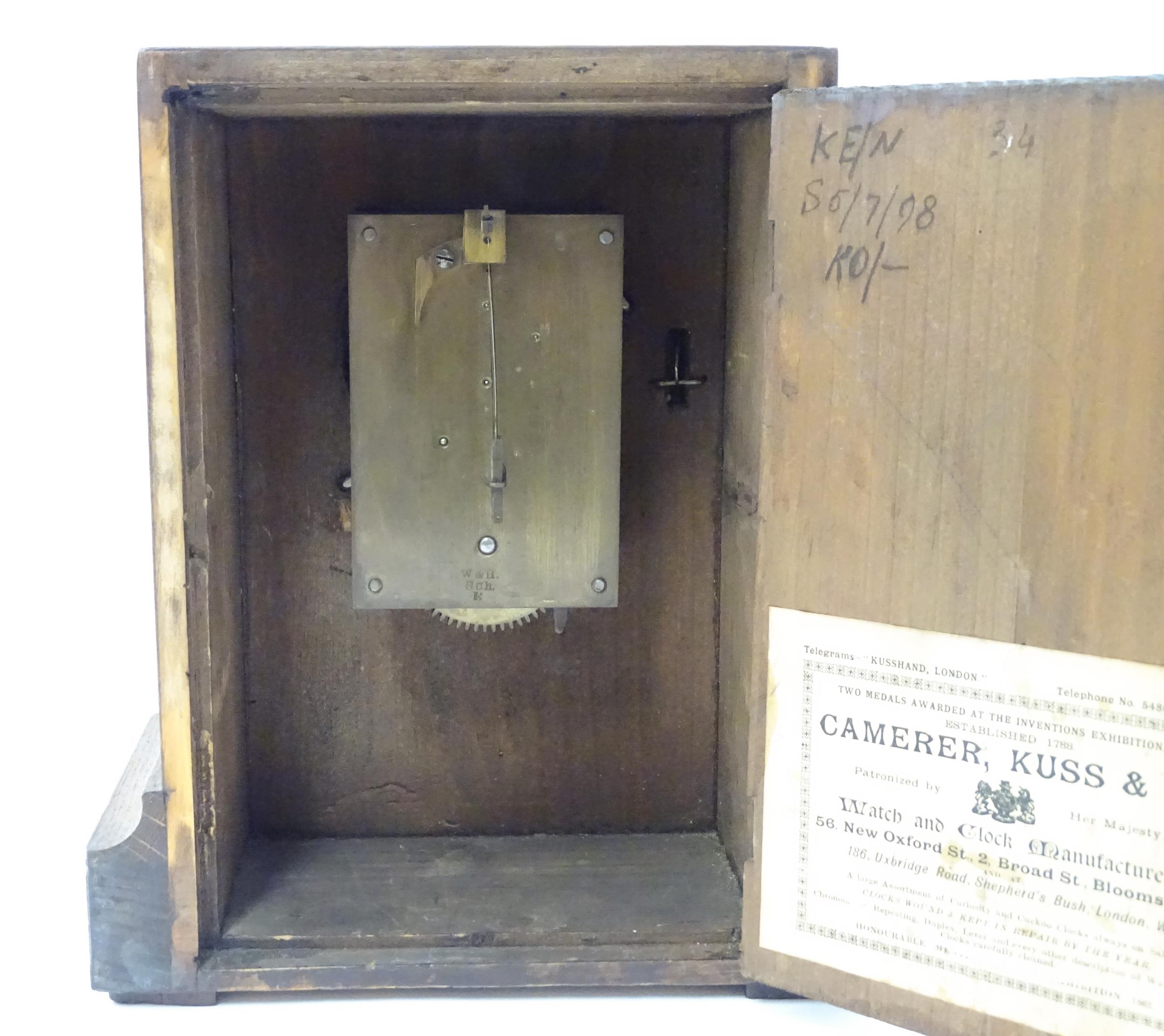 A 20thC oak cased mantle clock bearing label for Camerer, Kuss & Co. Approx. 9 1/4" high Please Note - Image 8 of 13