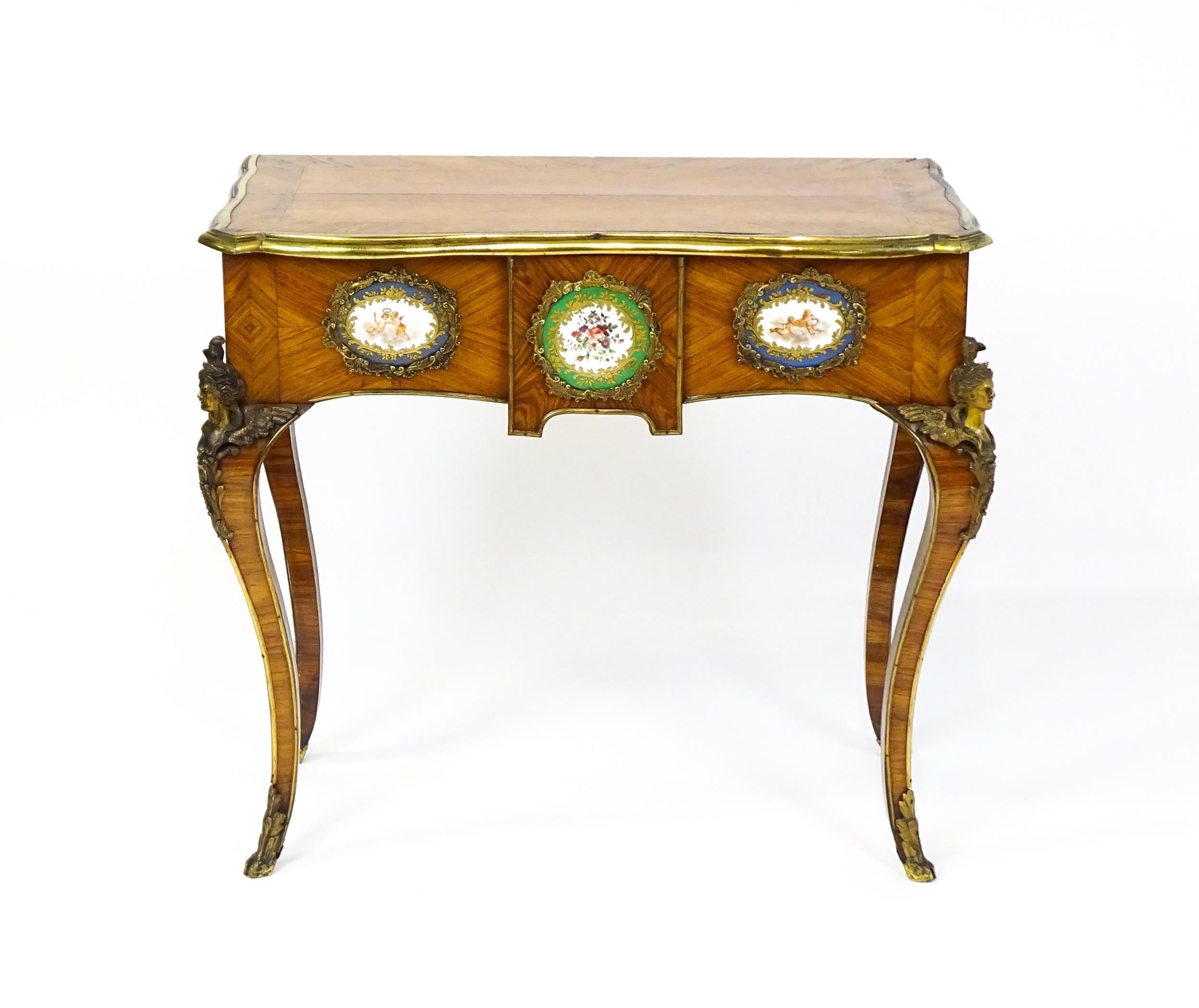 A mid 19thC kingwood side table with a brass moulding to the top edge and three Sevres style plaques - Image 6 of 14