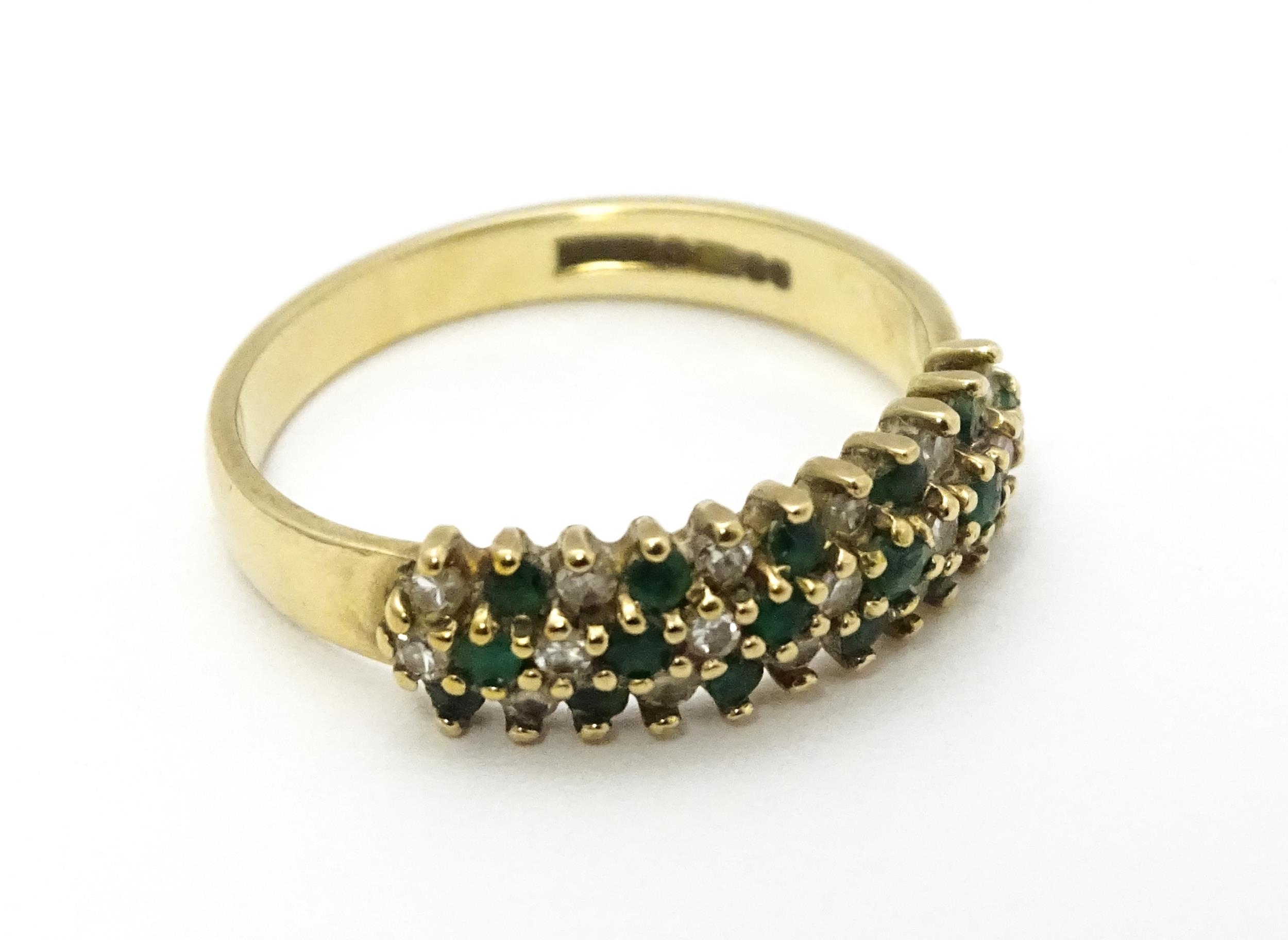 A 9ct gold ring set with emeralds and diamonds. Ring size approx. K Please Note - we do not make - Image 5 of 6