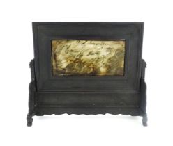 A Chinese table screen with inset hardstone panel, the ebonised stand with scrolling decoration.