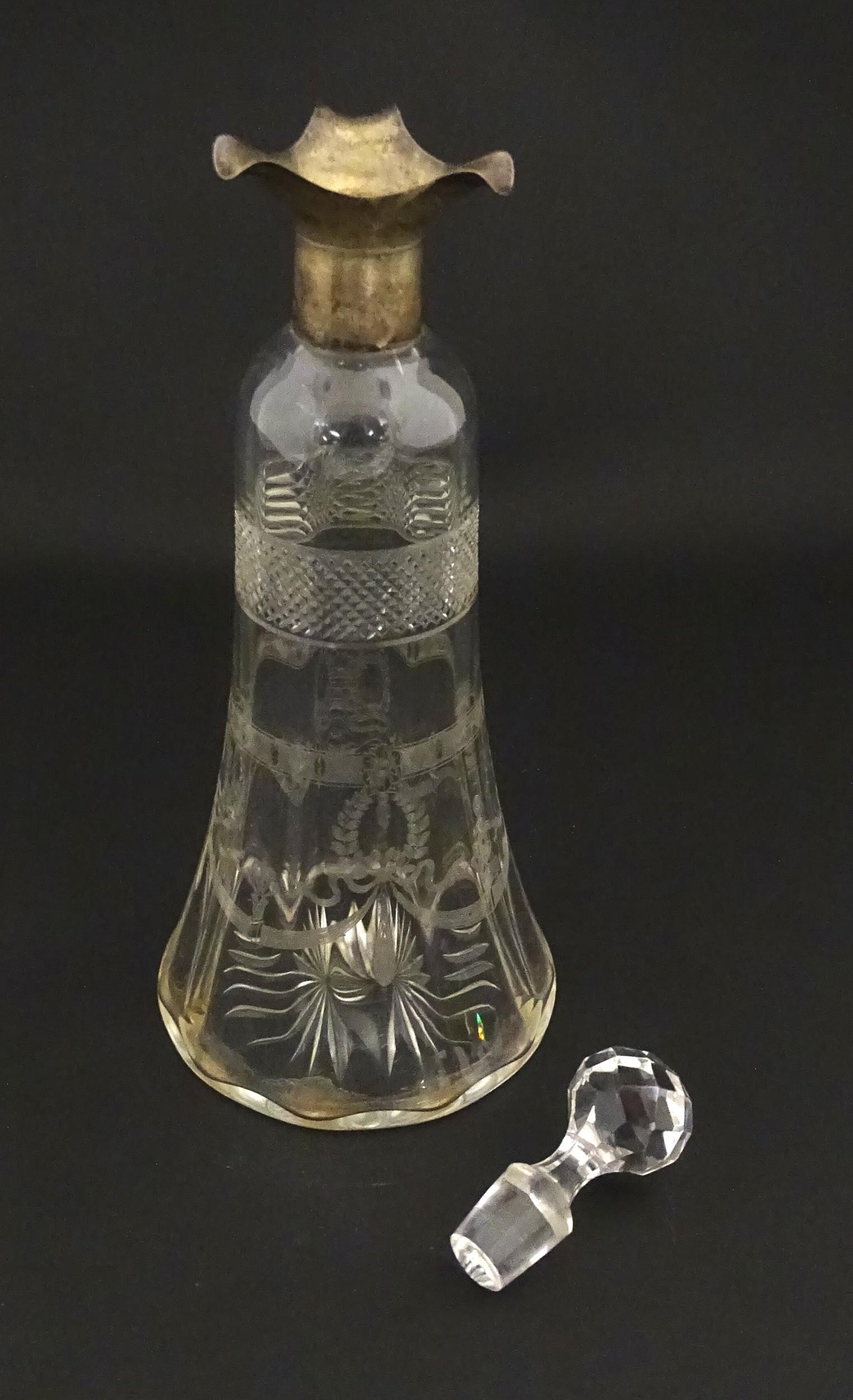 A cut glass decanter with silver mounts hallmarked Birmingham 1911. Approx. 9 1/4" high Please - Image 4 of 9