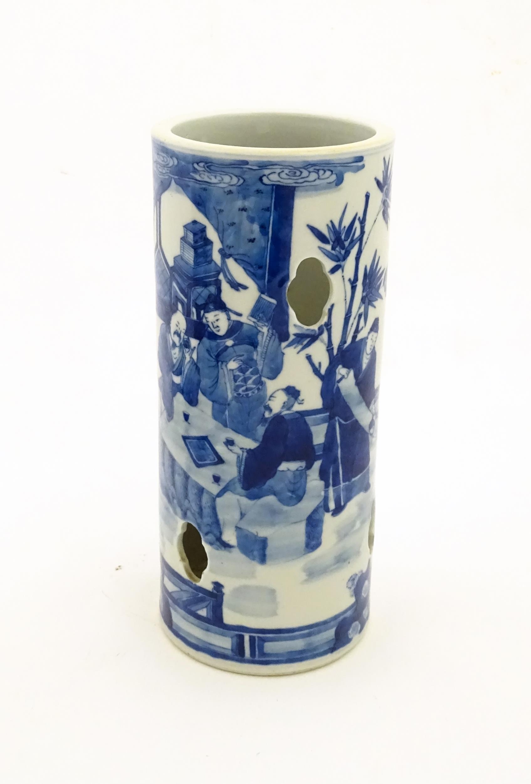 A Chinese blue and white hat stand decorated with scholars in a garden landscape. Approx. 11 1/2" - Image 3 of 6