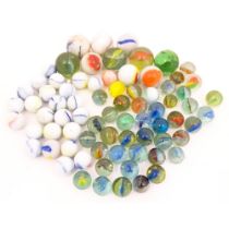 Toys: A quantity of glass marbles, many with colours twists, etc. Largest approx. 1" Please Note -