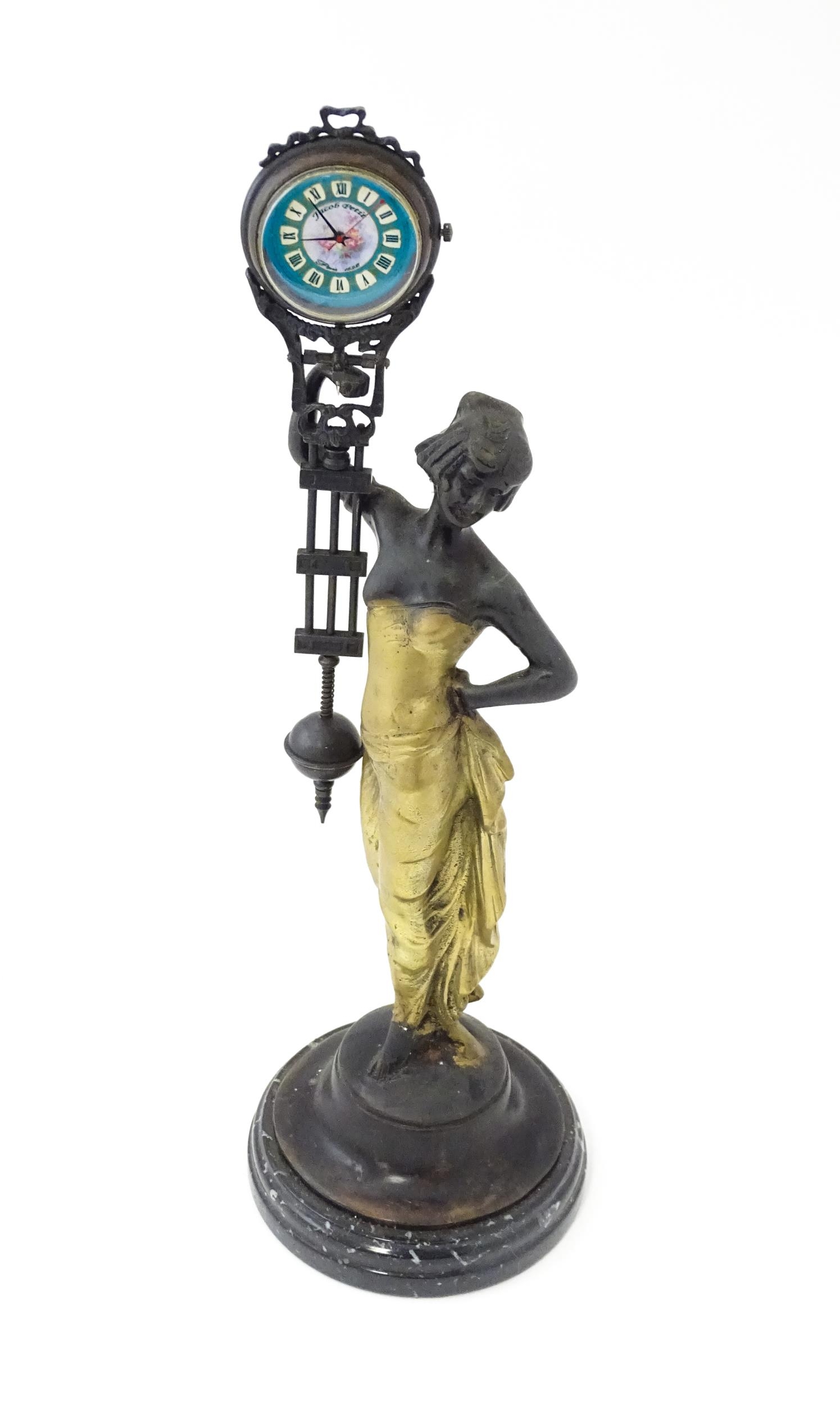 A Continental Art Nouveau style mystery clock (swing clock), with figural detail. Approx. 11 1/2" - Image 3 of 10