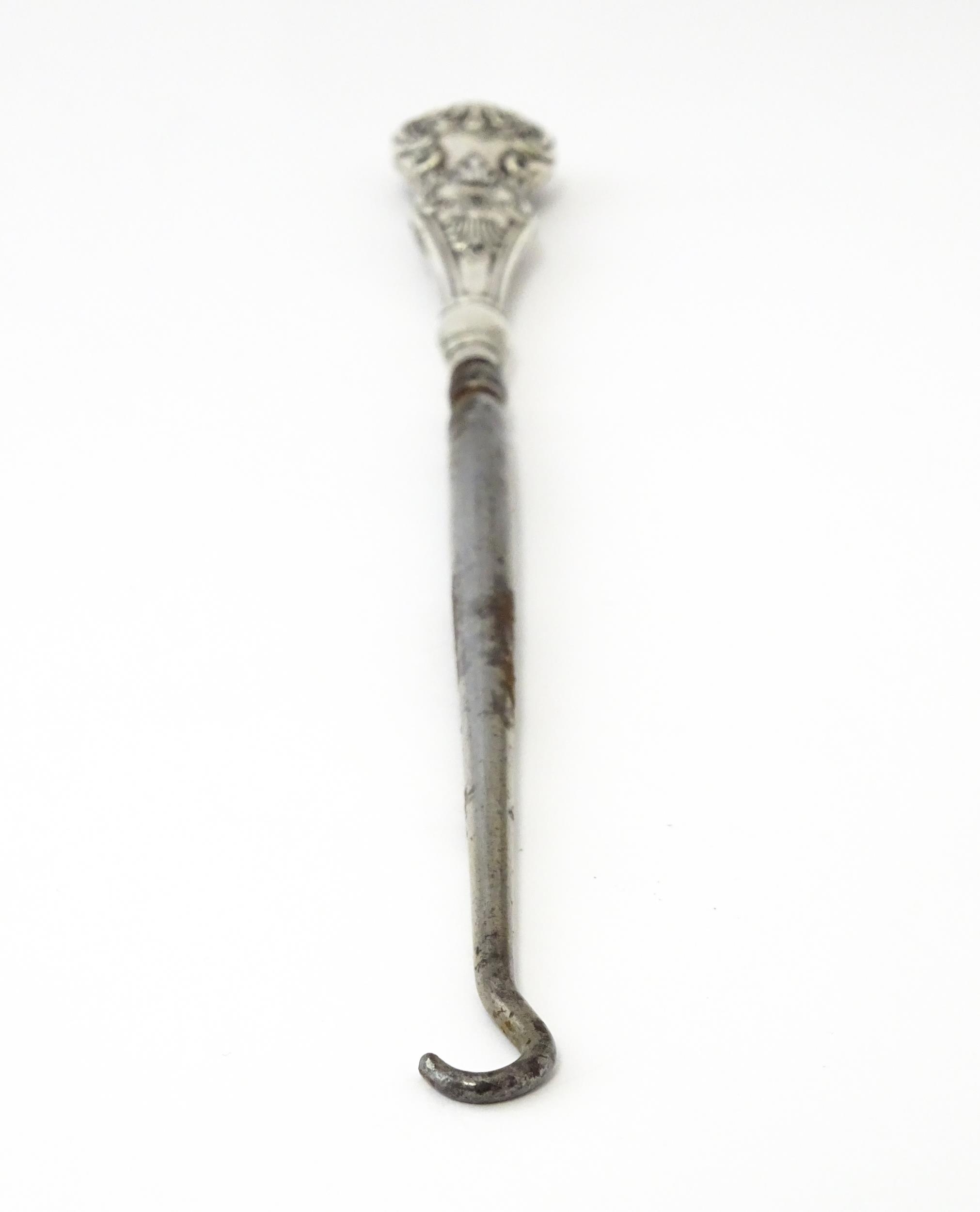 A silver handled button hook hallmarked Birmingham 1902. Approx 9" long Please Note - we do not make - Image 6 of 6