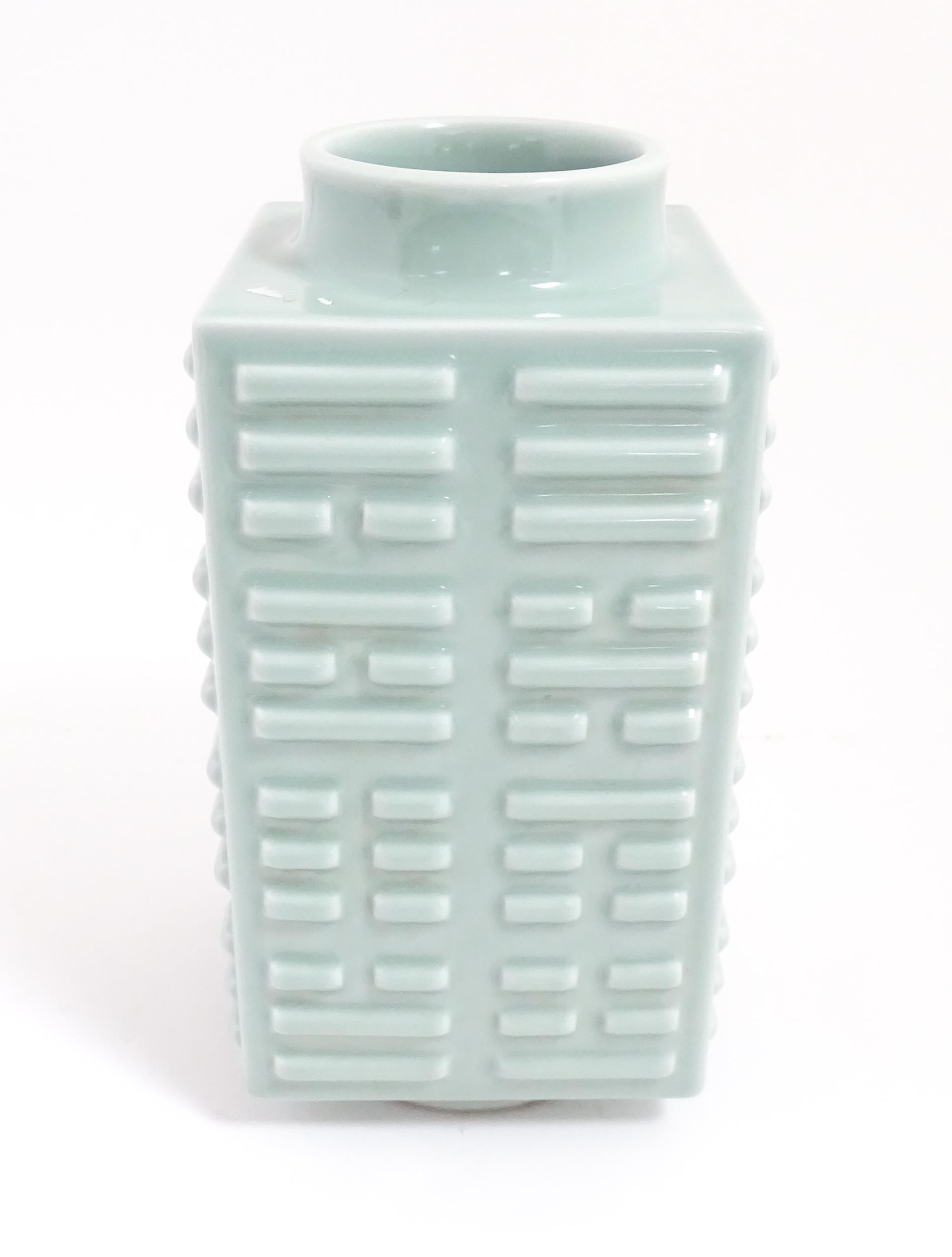 A Chinese celadon vase of squared form with relief detail. Character marks under. Approx. 11" high - Image 3 of 6