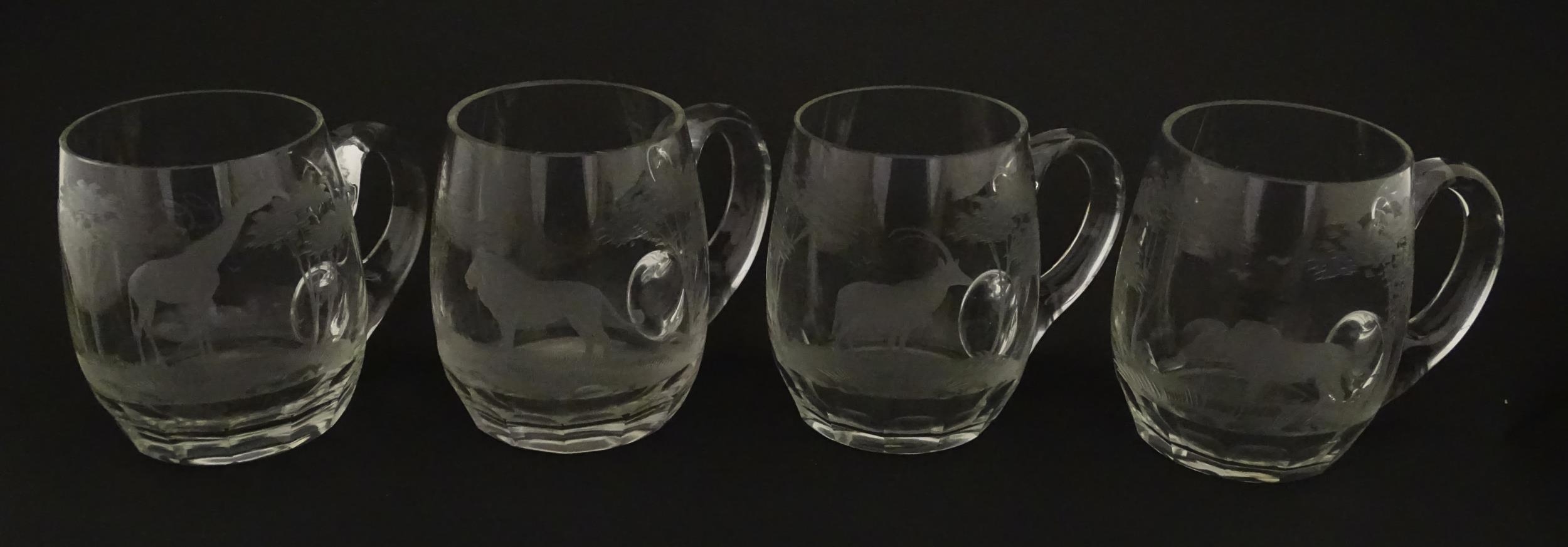 Seven Rowland Ward pint mugs / glasses with engraved Safari animal detail. Unsigned. Approx. 4 1/ - Image 3 of 26