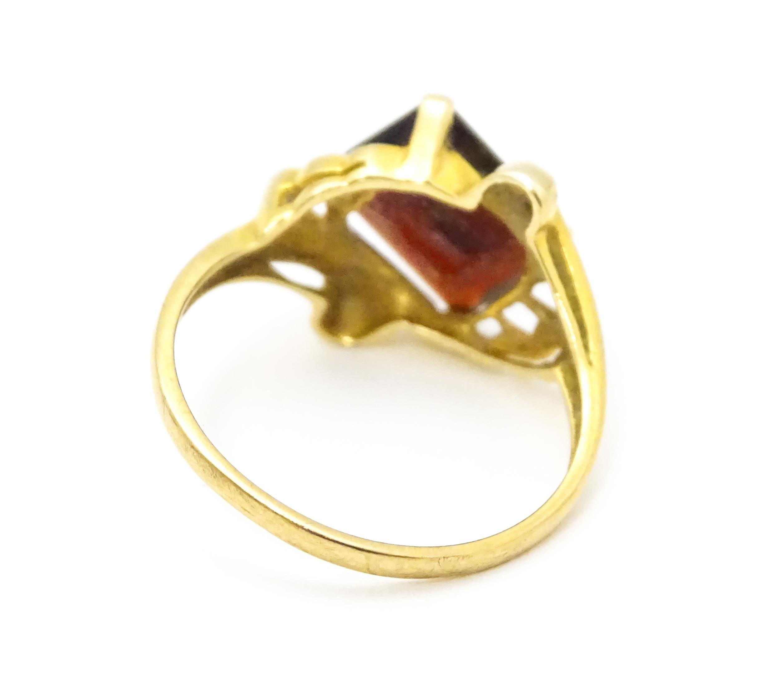 A 9ct gold ring set with central garnet. Ring size approx. O 1/2 Please Note - we do not make - Image 6 of 7