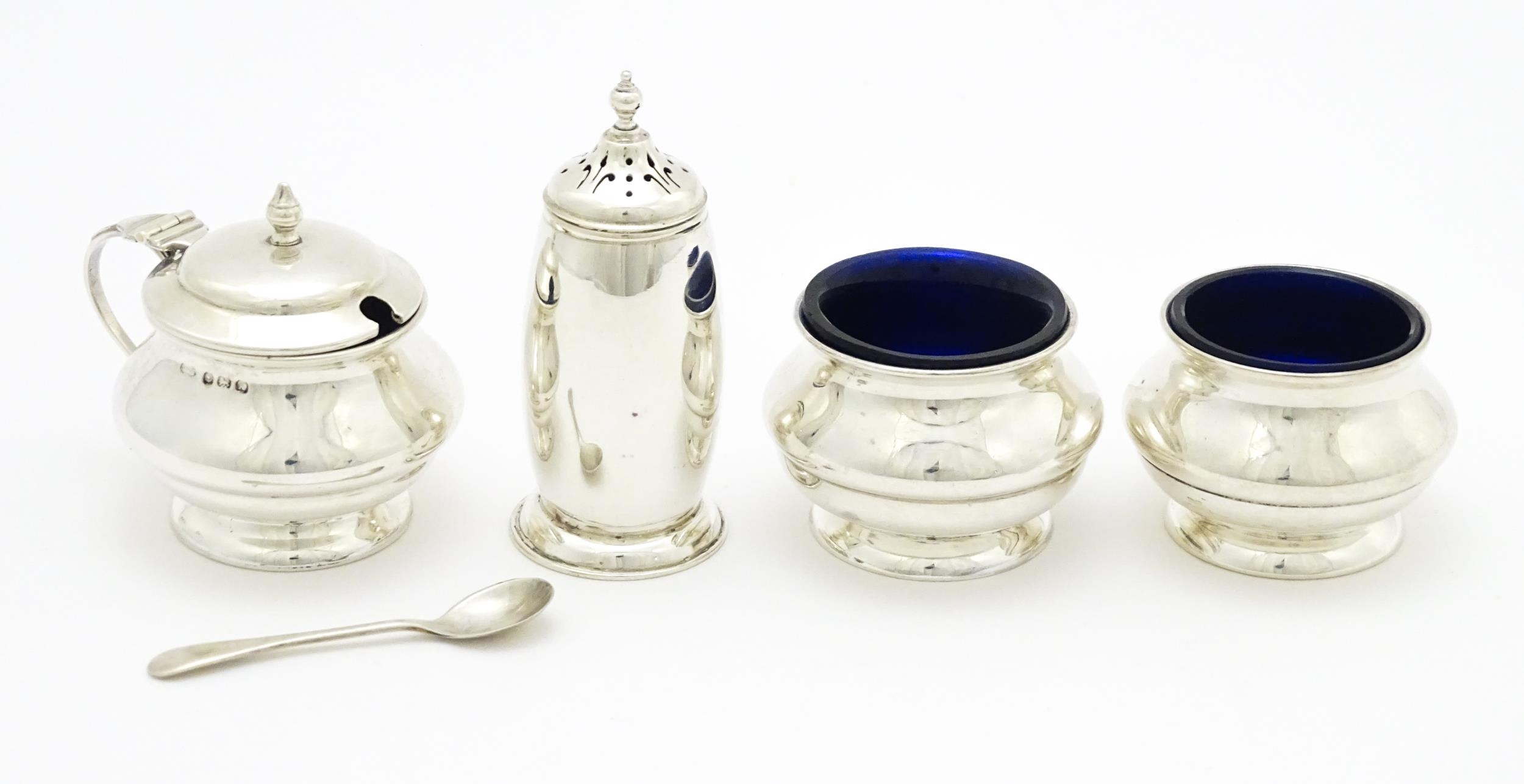 A matched four piece silver cruet set comprising pepper, mustard with spoon and two salts with - Image 12 of 12