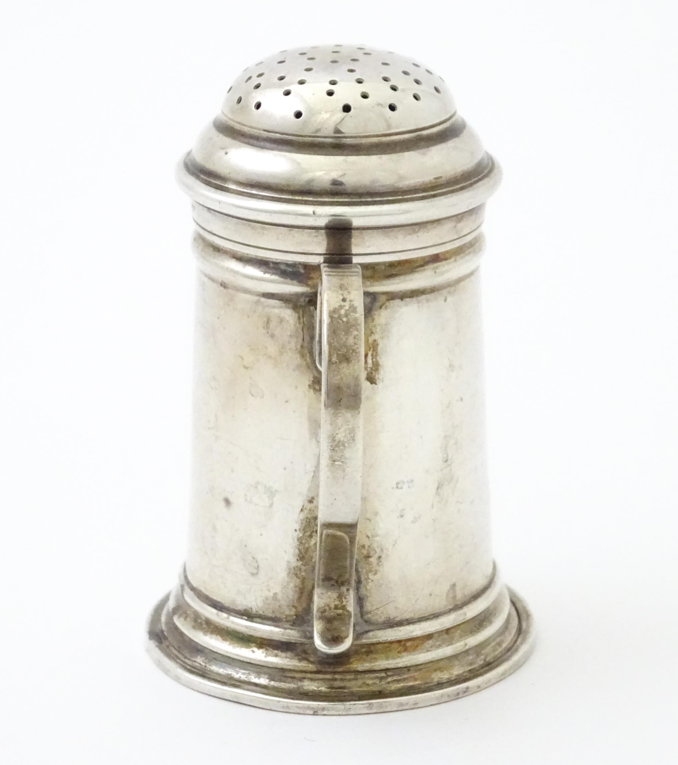 An American sterling silver pepperette modelled as a flour shaker. Marked under Georg Jensen Inc, - Image 6 of 8